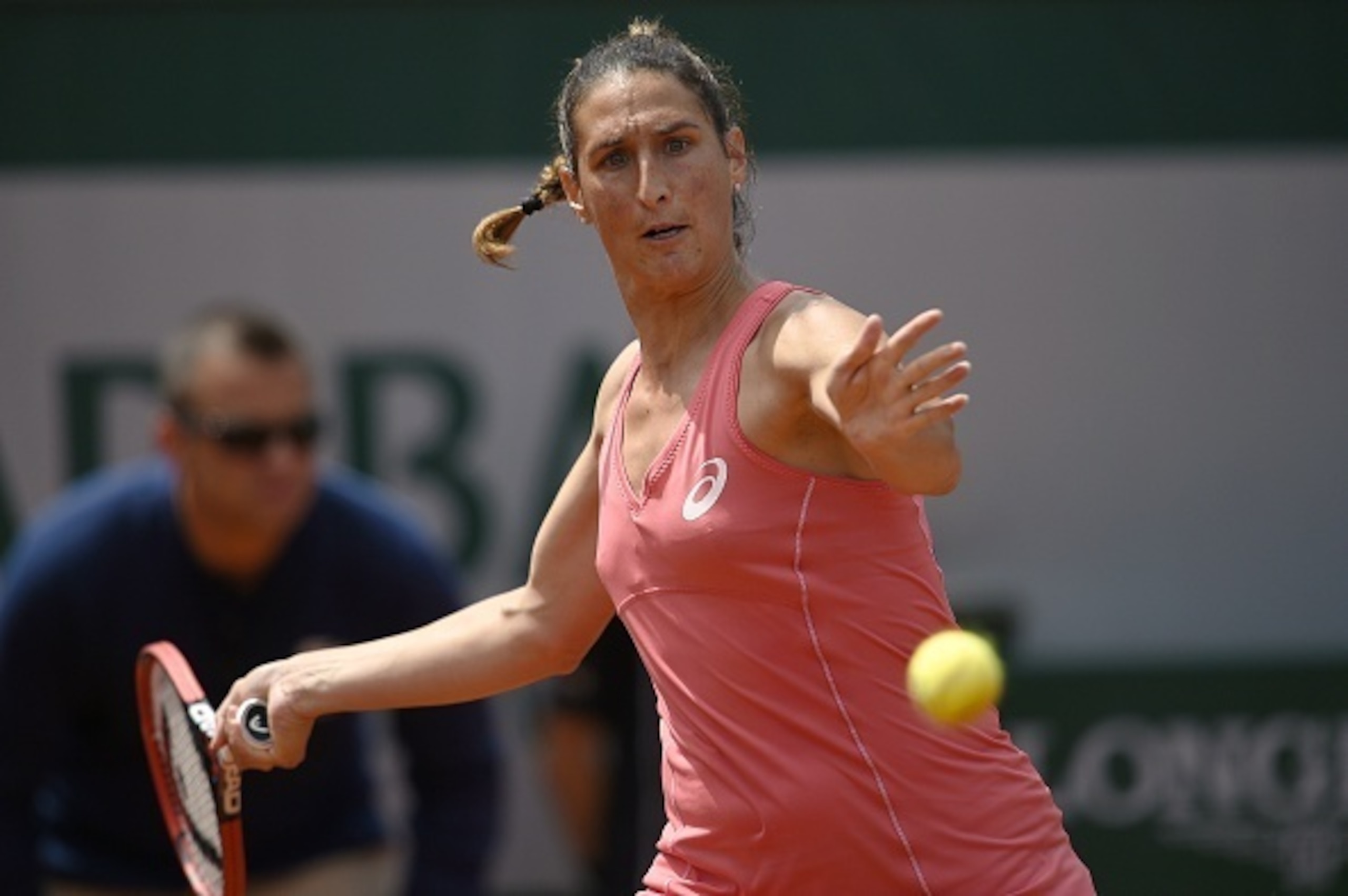 Virginie Razzano hits a forehand during the 2015 French Open.