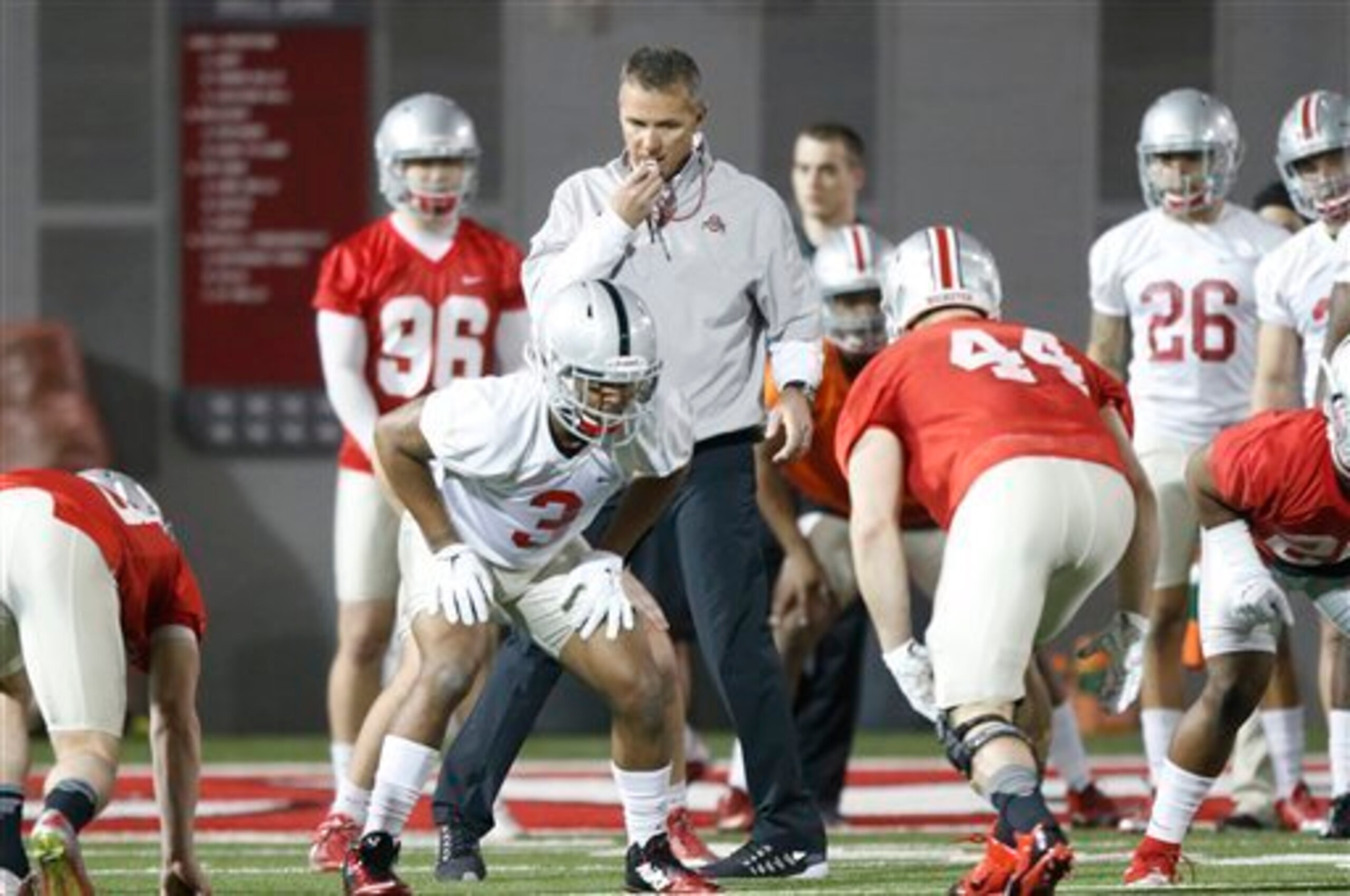 Ohio State HC Urban Meyer (center)