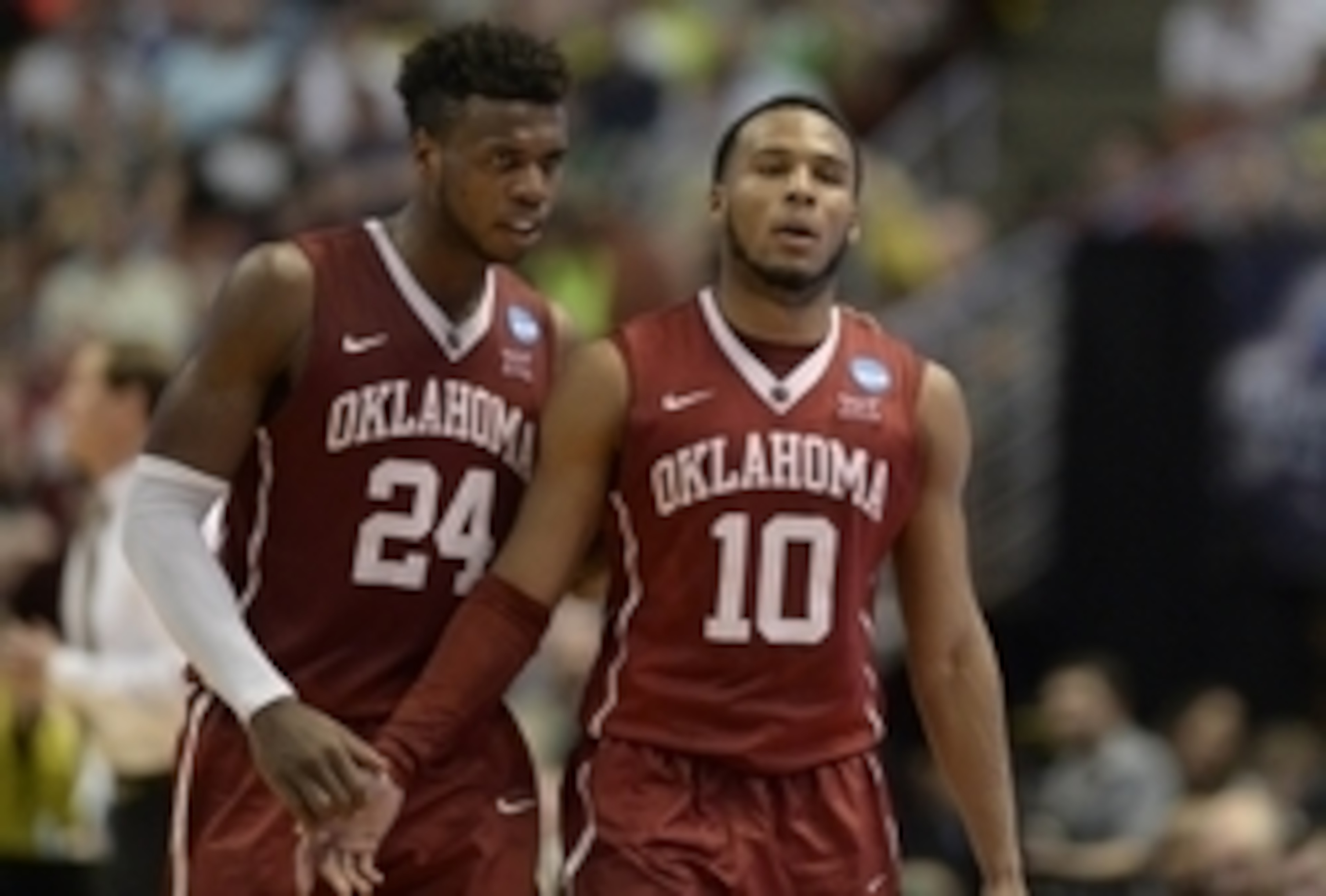 Buddy Hield (24) and Jordan Woodard (10)