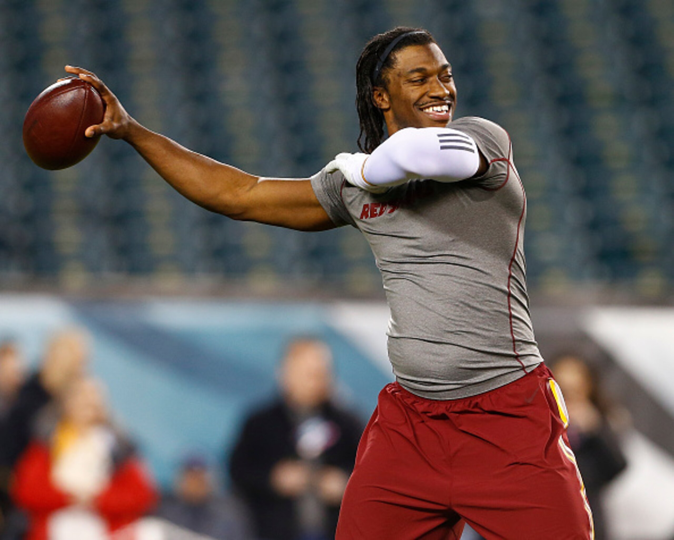 PHILADELPHIA, PA - DECEMBER 26: Quarterback Robert Griffin III #10 of the Washington Redskins warms up before a football game against the Philadelphia Eagles at Lincoln Financial Field on December 26, 2015 in Philadelphia, Pennsylvania. (Photo by Rich Sch