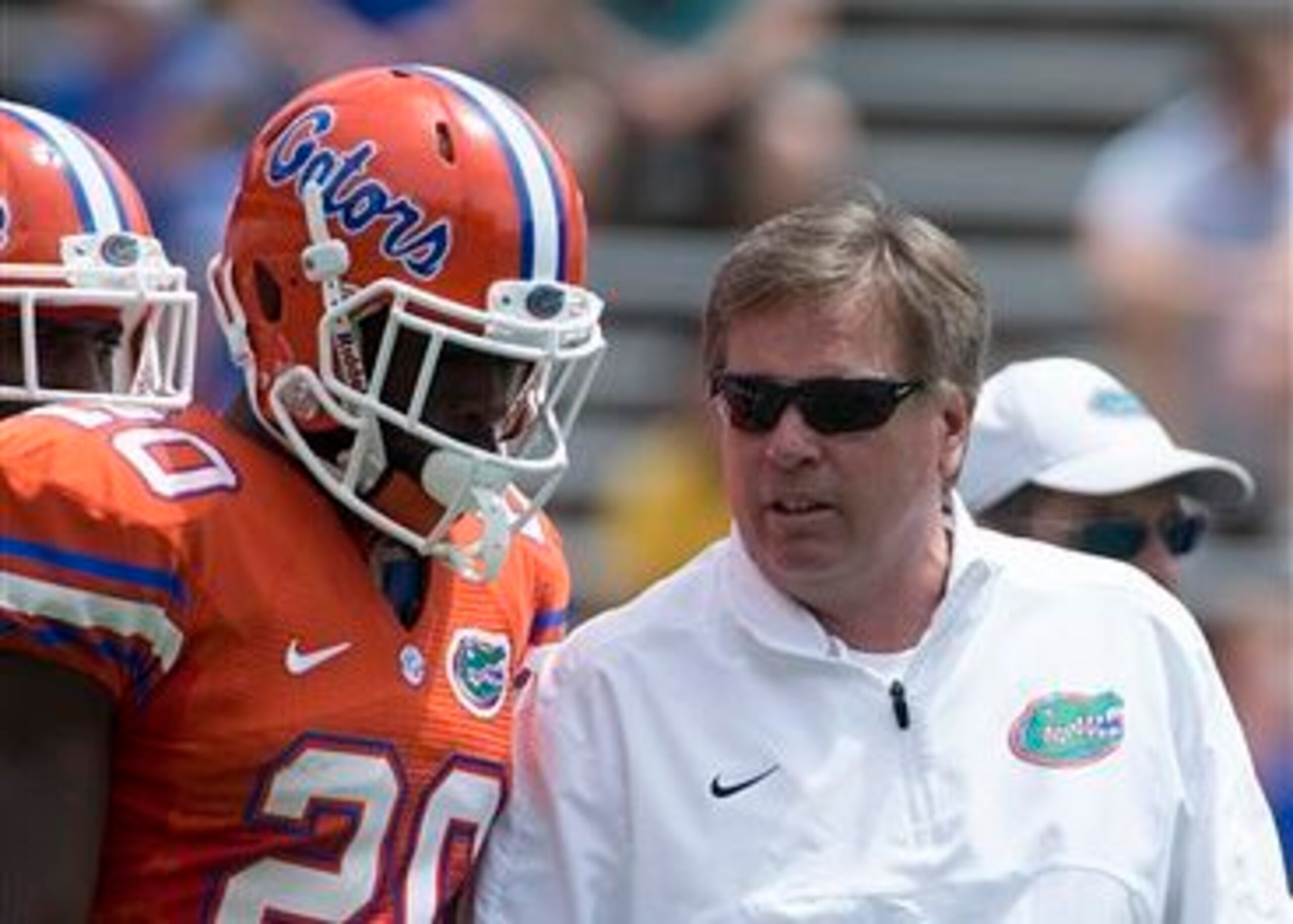 Florida DB Marcus Maye and HC Jim McElwain