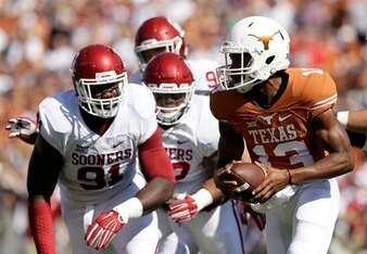 Texas QB Jerrod Heard (right)