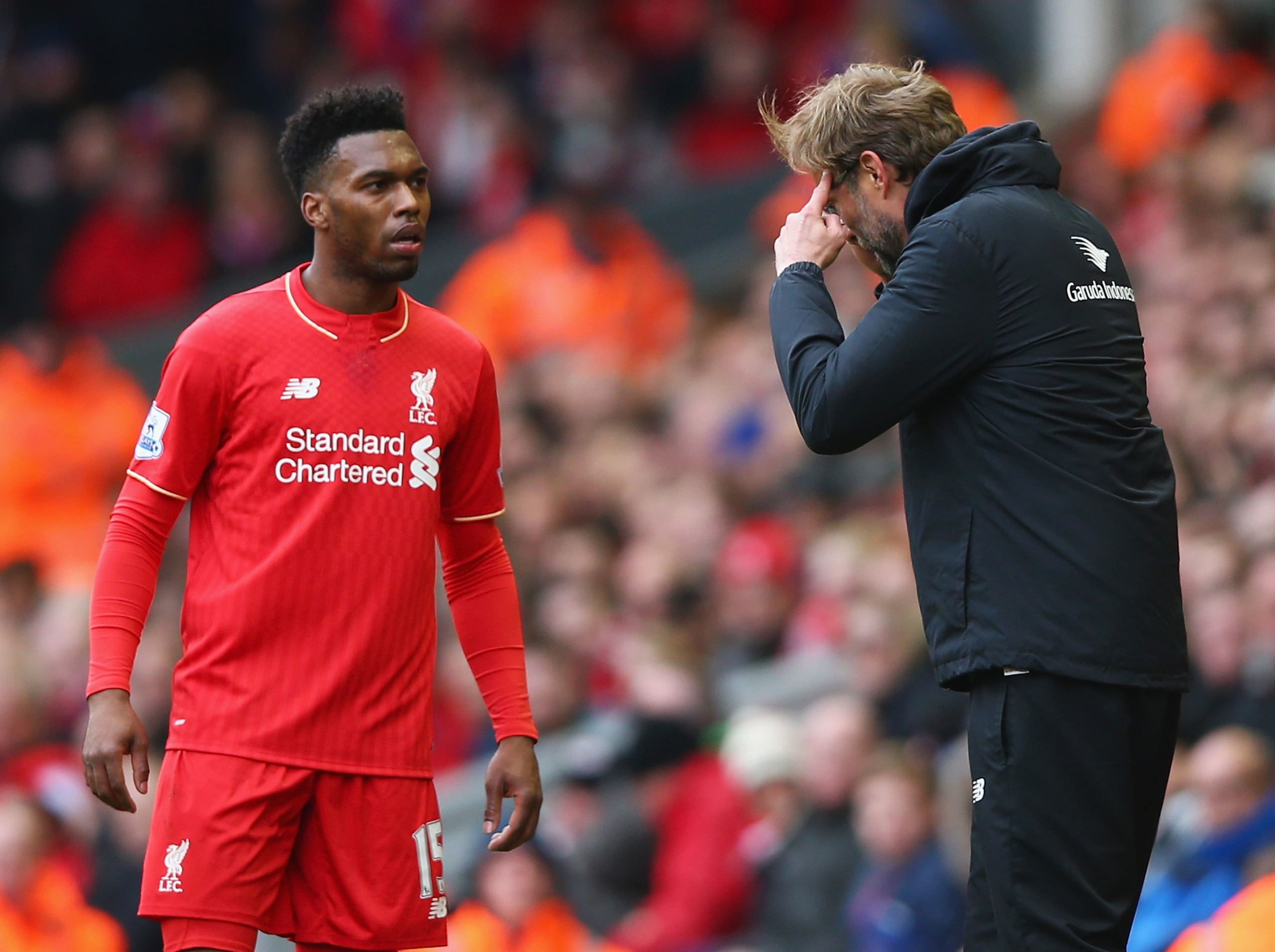 Daniel Sturridge is given some instructions by his manager during the 4-1 victory.
