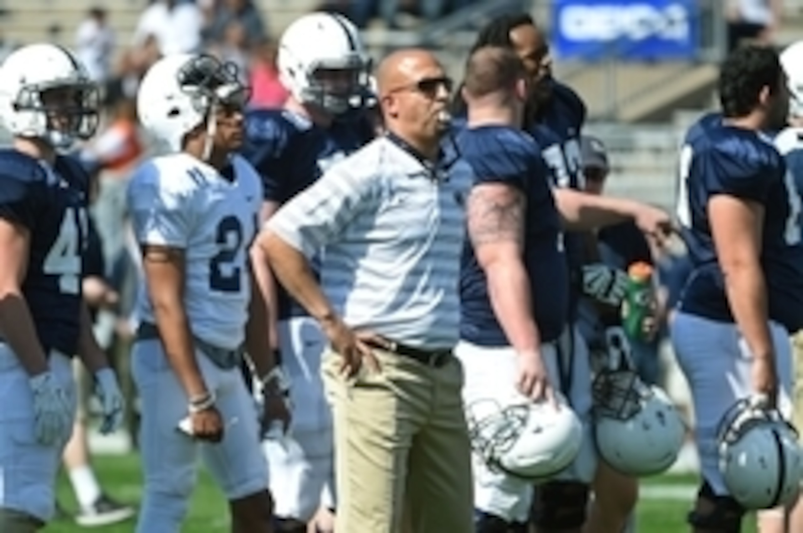 Penn State HC James Franklin (center)
