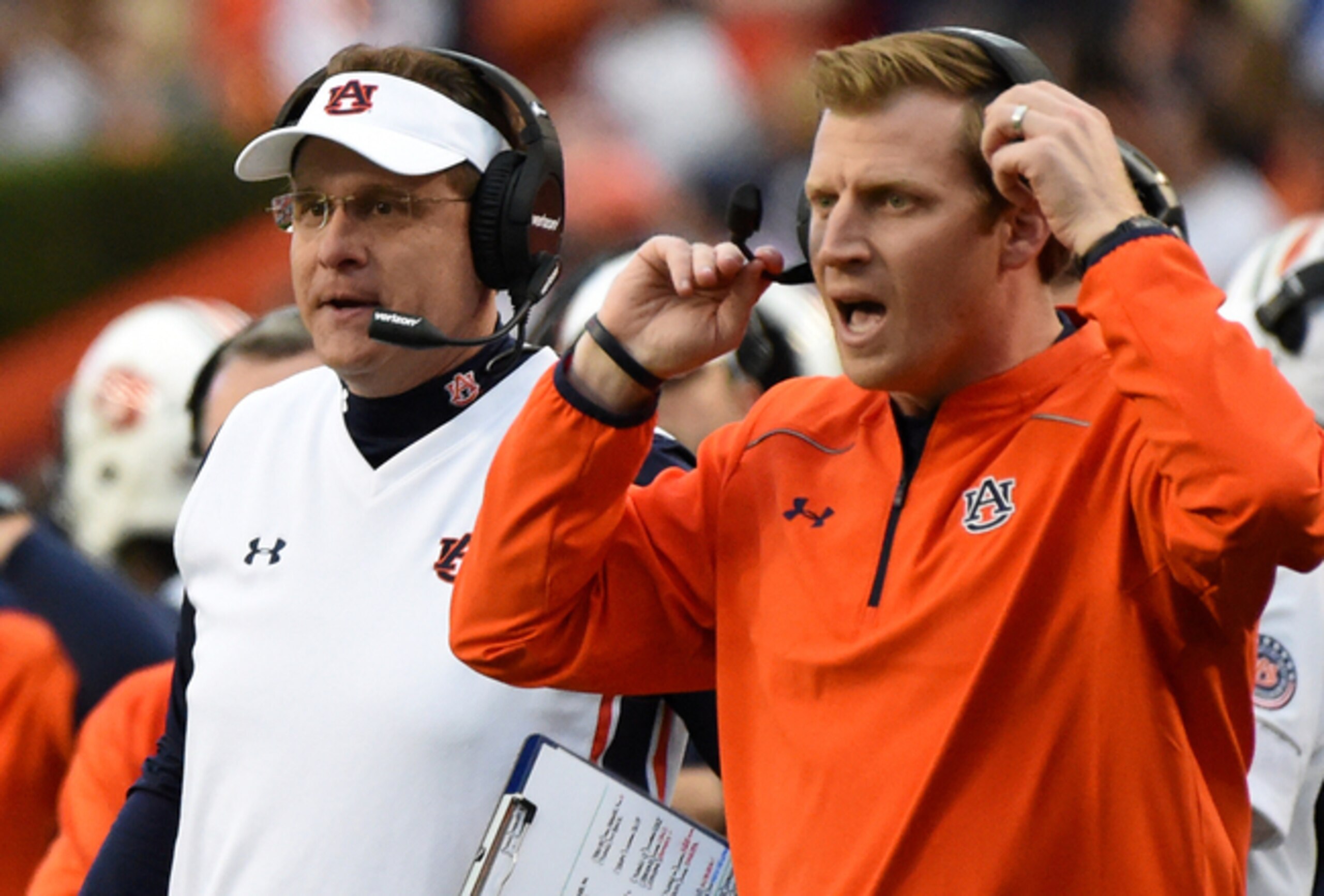 Auburn head coach Gus Malzahn (left) and OC Rhett Lashlee