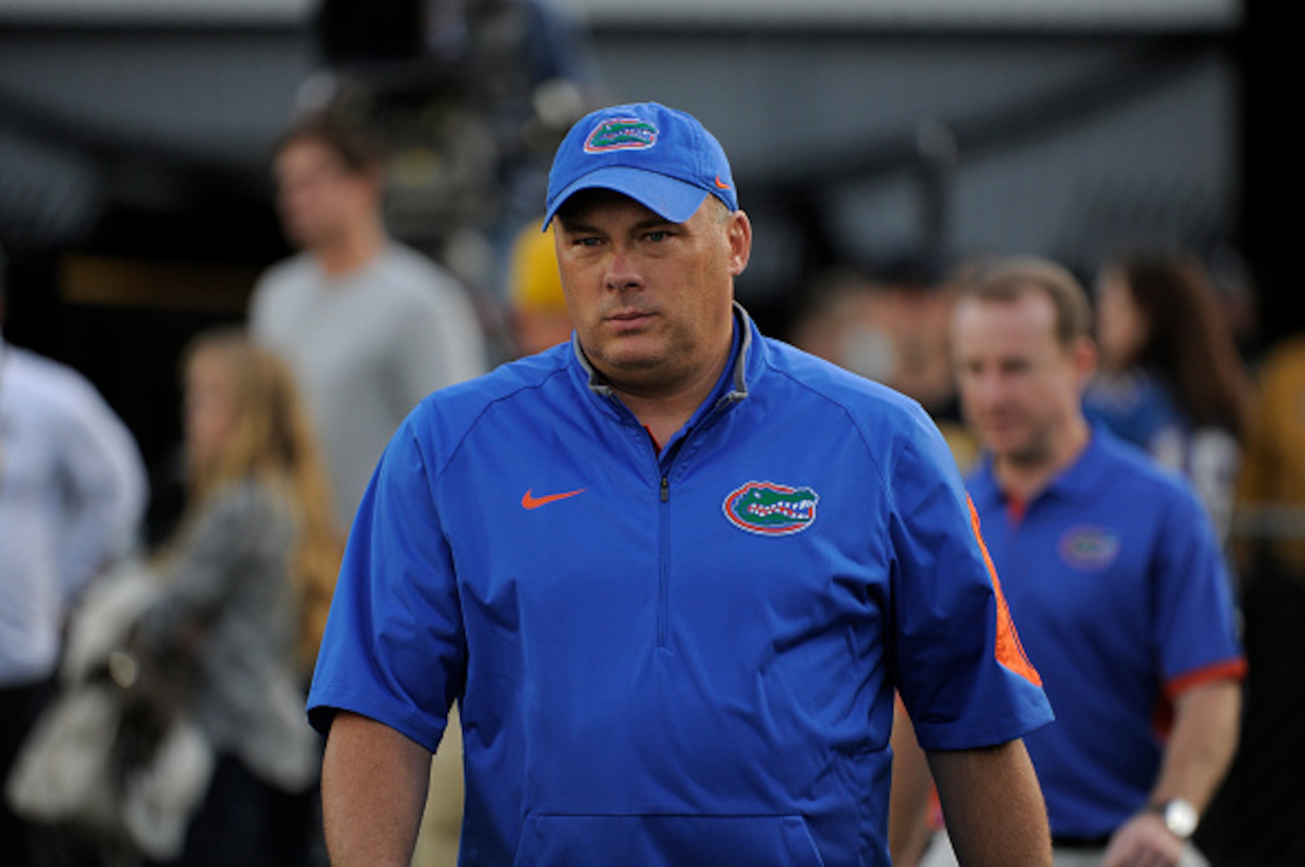 COLUMBIA , MO - OCTOBER 10:  Geoff Collins defensive coordinator of the Florida Gators enter Memorial Stadium prior to a game against the Missouri Tigers on October 10, 2015 in Columbia, Missouri.  (Photo by Ed Zurga/Getty Images)