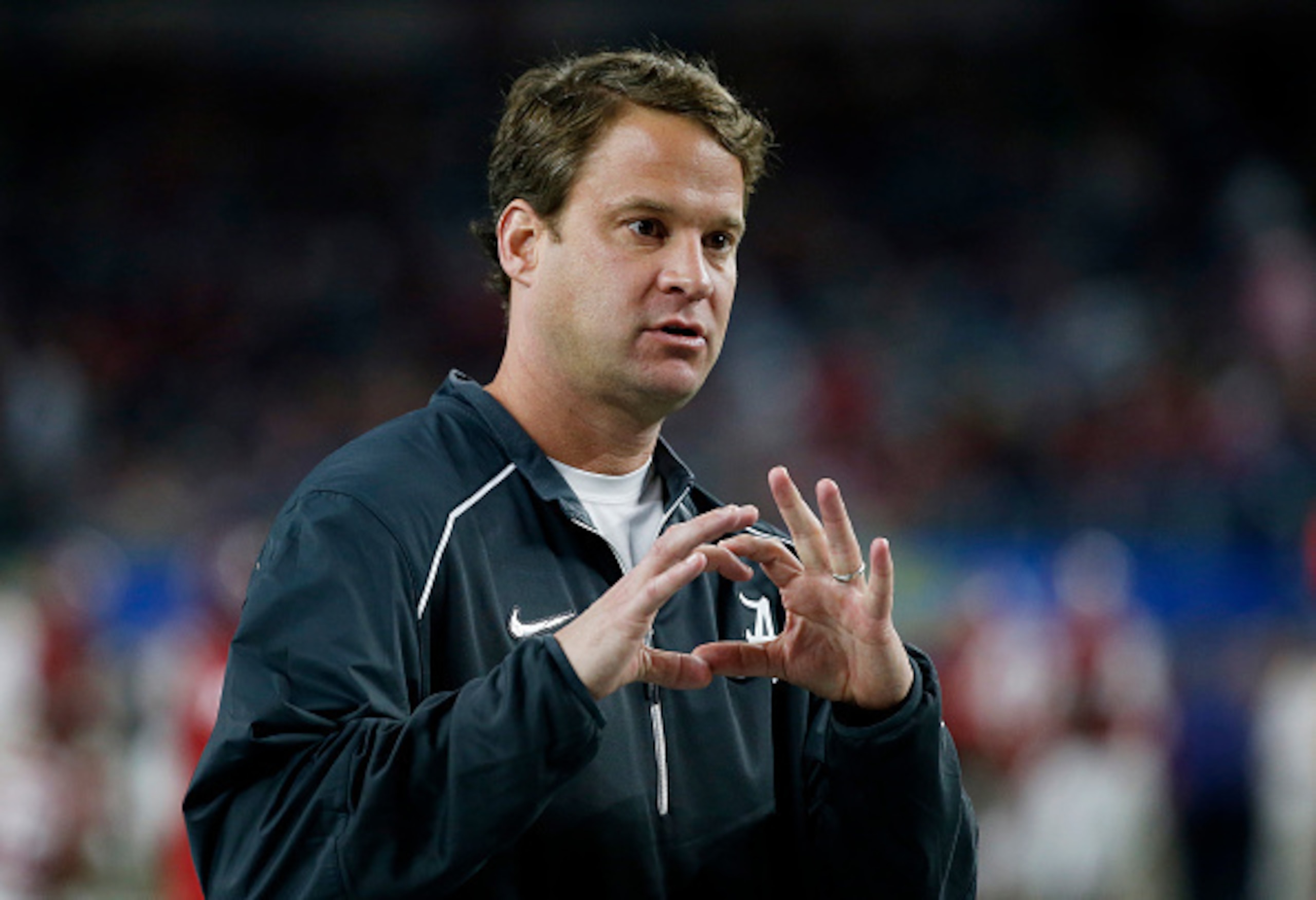 ARLINGTON, TX - DECEMBER 31:  Offensive coordinator Lane Kiffin for the Alabama Crimson Tide looks on prior to the Goodyear Cotton Bowl against the Michigan State Spartans at AT&T Stadium on December 31, 2015 in Arlington, Texas.  (Photo by Scott Halleran
