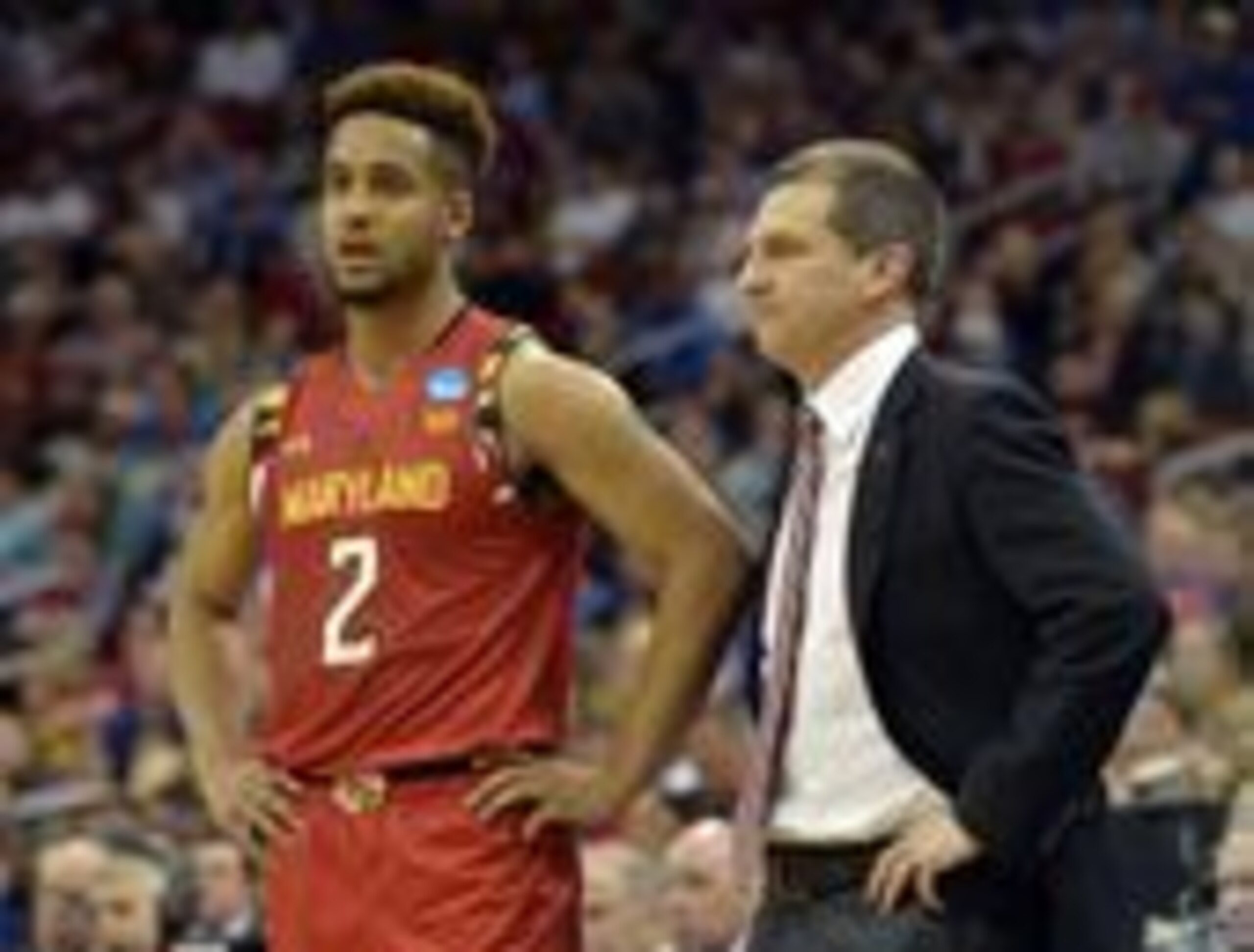 Mar 24, 2016; Louisville, KY, USA; Maryland Terrapins head coach Mark Turgeon talks to guard Melo Trimble (2) during the first half against the Kansas Jayhawks in a semifinal game in the South regional of the NCAA Tournament at KFC YUM!. Mandatory Credit:
