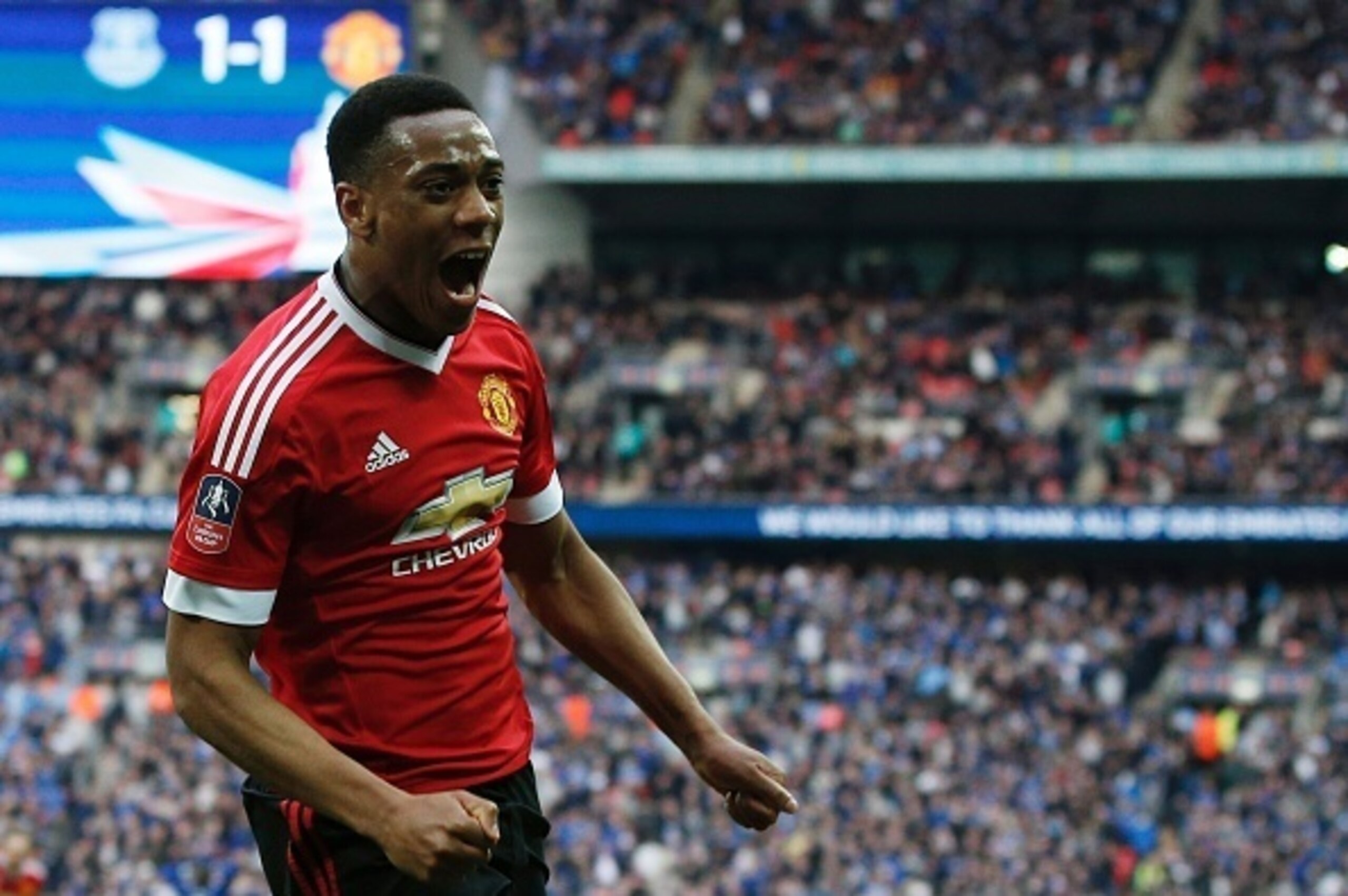 Martial celebrates his winner.