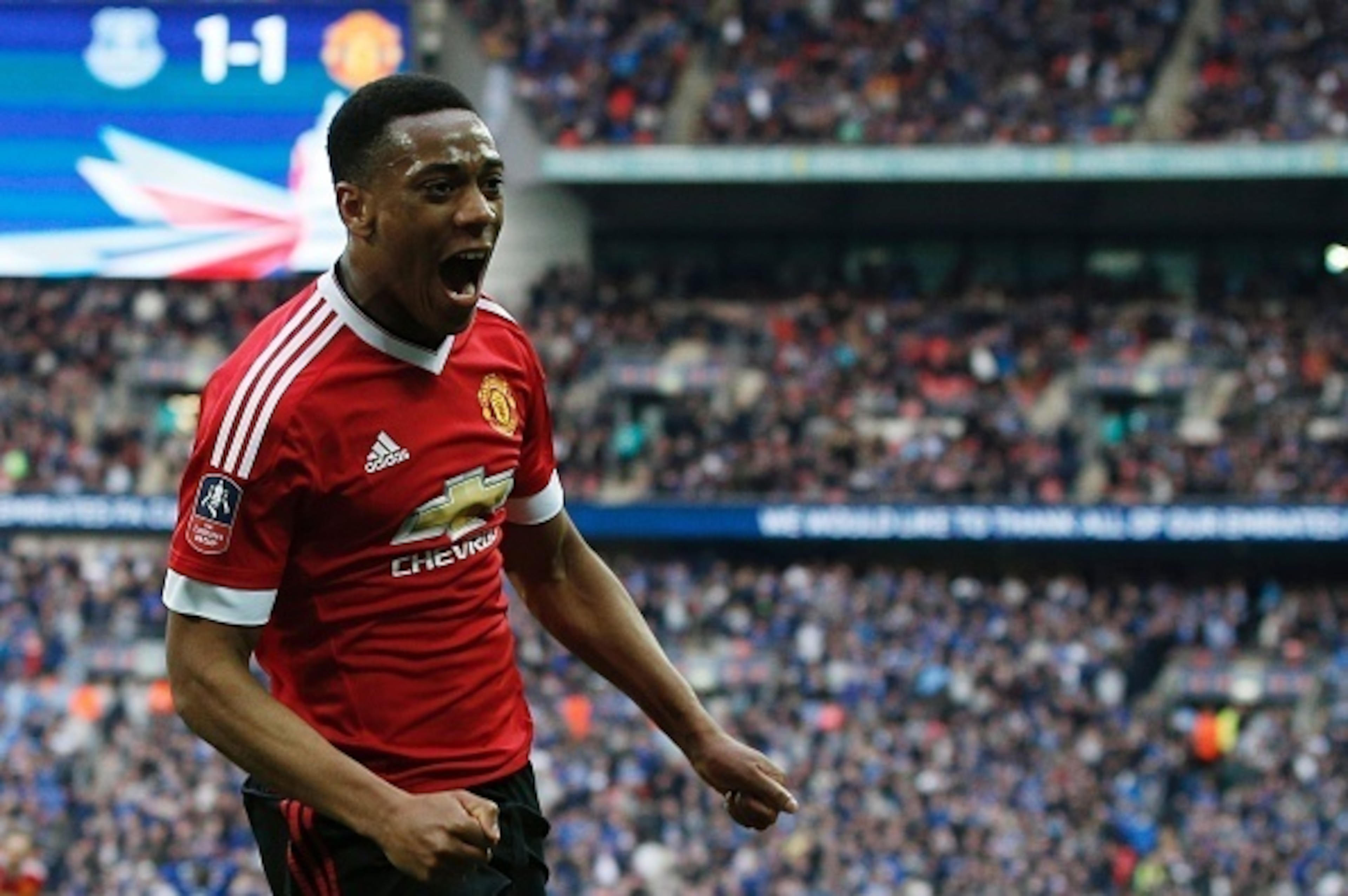 Martial celebrates his winner.