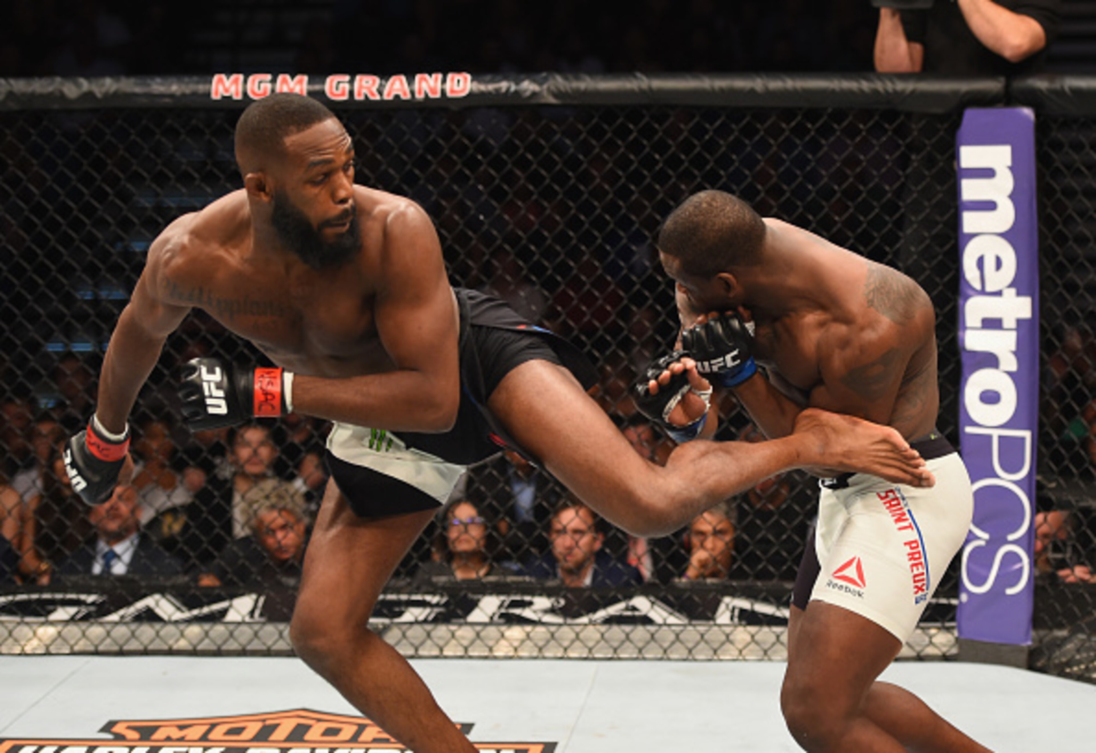 Jon Jones (left) hits a spinning back kick on Ovince Saint Preux. Jon Jones (left) hits a spinning back kick on Ovince Saint Preux.