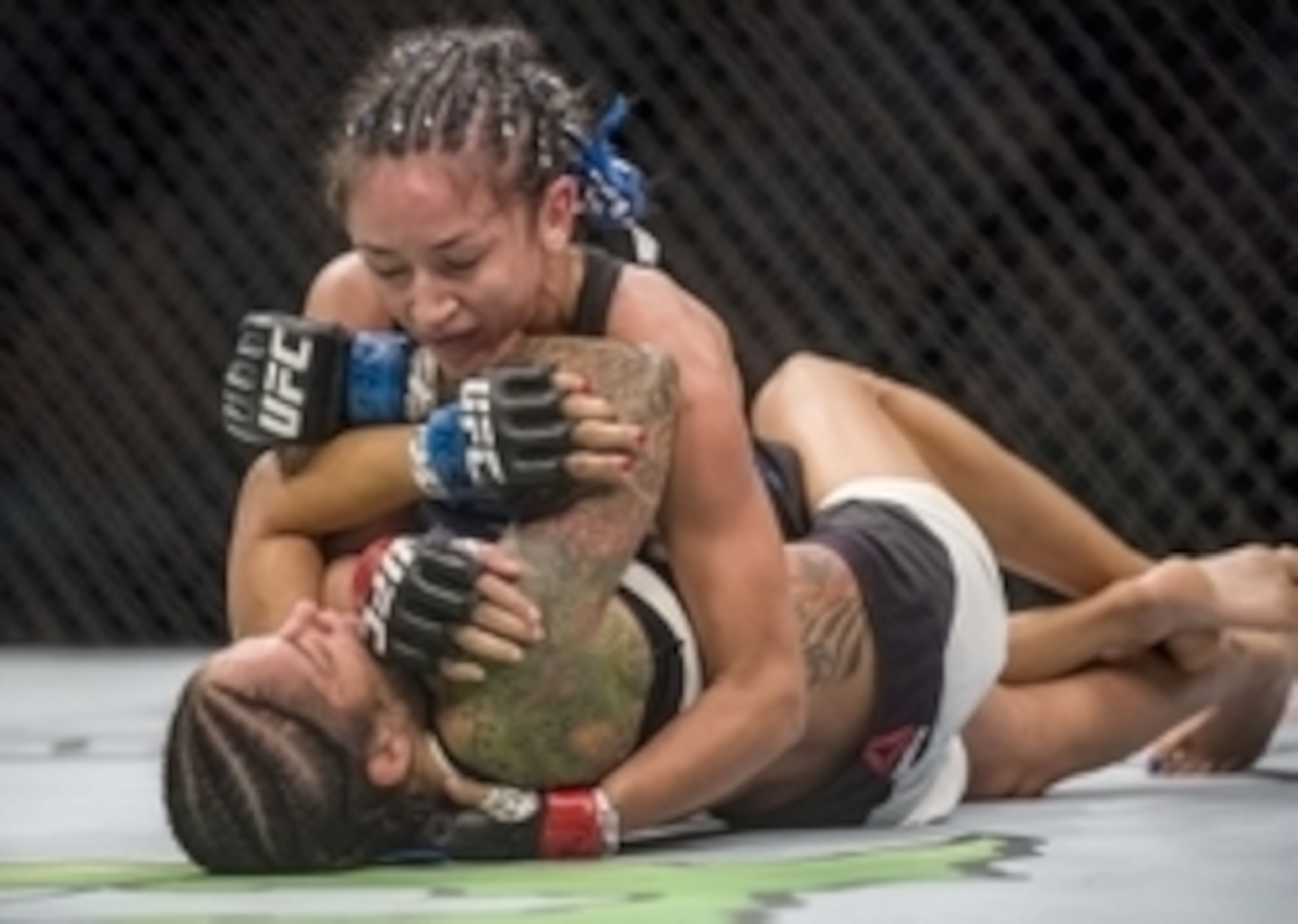 Carla Esparza (top) defeated Juliana Lima on the evening's undercard.