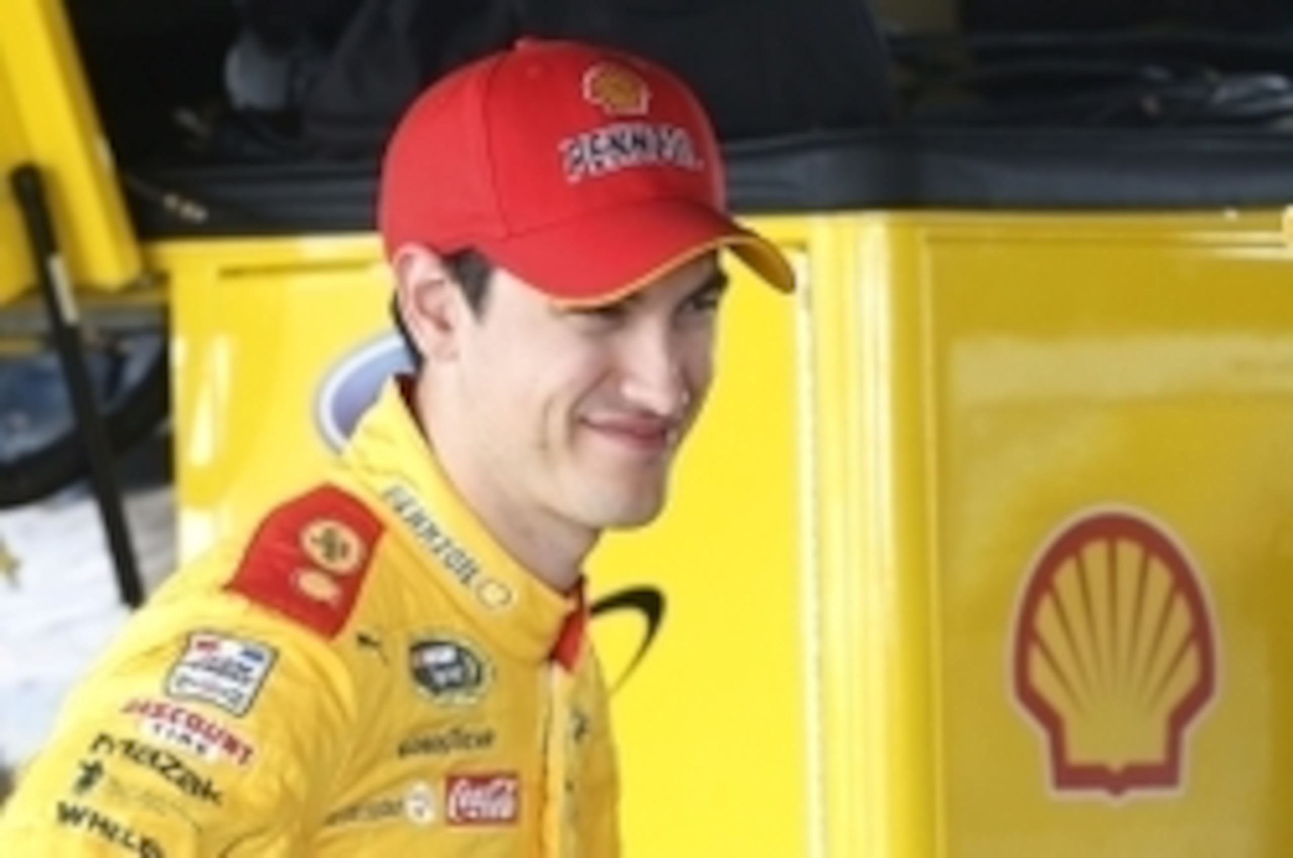 Apr 22, 2016; Richmond, VA, USA; Sprint Cup Series driver Joey Logano (22) looks on from the garage prior to practice for the Toyota Owners 400 at Richmond International Raceway. Mandatory Credit: Amber Searls-USA TODAY Sports