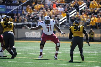 COLUMBIA , MO - OCTOBER 3:  Offensive tackle Brandon Shell #71 of the South Carolina Gamecocks blocks out against the Missouri Tigers at Memorial Stadium on October 3, 2015 in Columbia, Missouri.  (Photo by Ed Zurga/Getty Images)