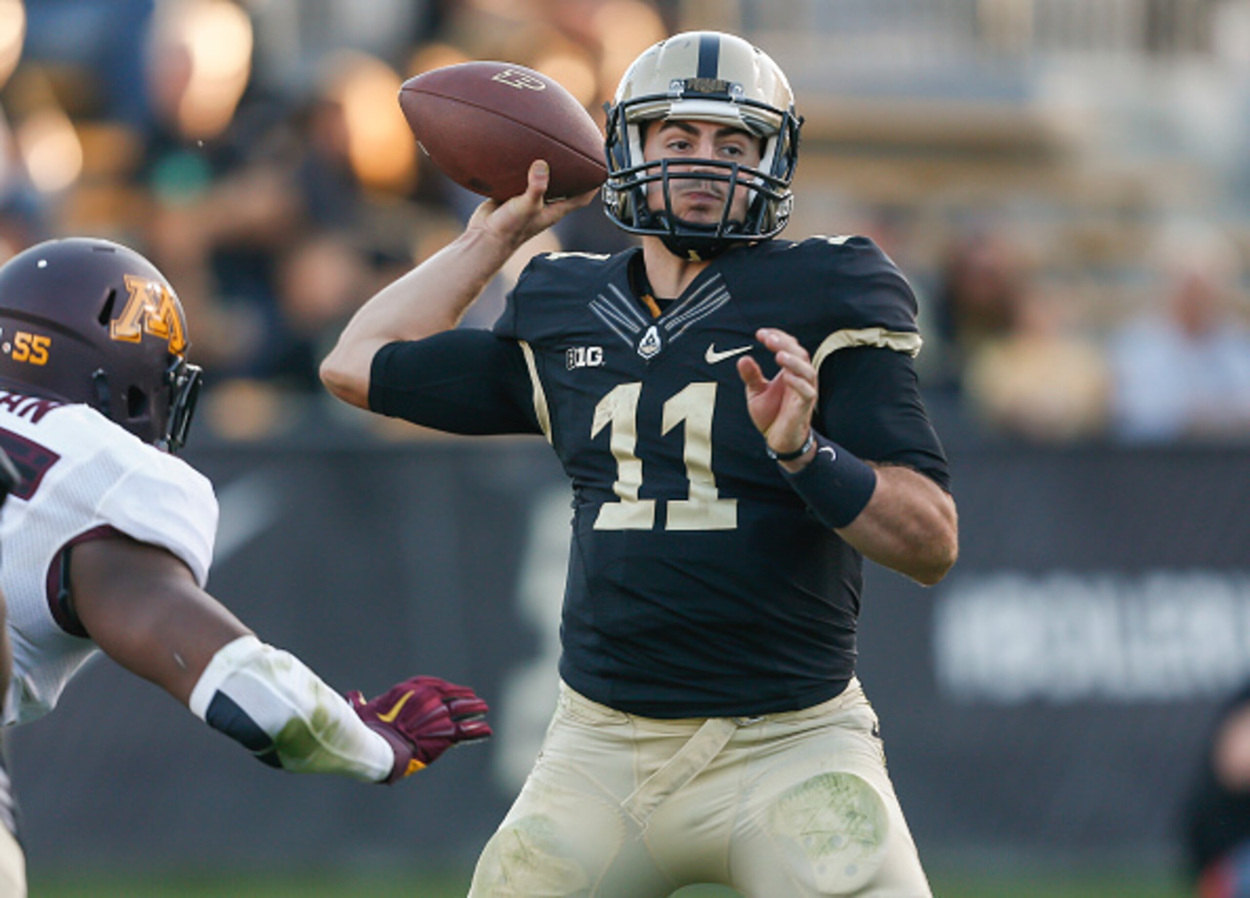 WEST LAFAYETTE, IN - OCTOBER 10: David Blough #11 of the Purdue Boilermakers drops back to pass against the Minnesota Golden Gophers at Ross-Ade Stadium on October 10, 2015 in West Lafayette, Indiana.  (Photo by Michael Hickey/Getty Images)