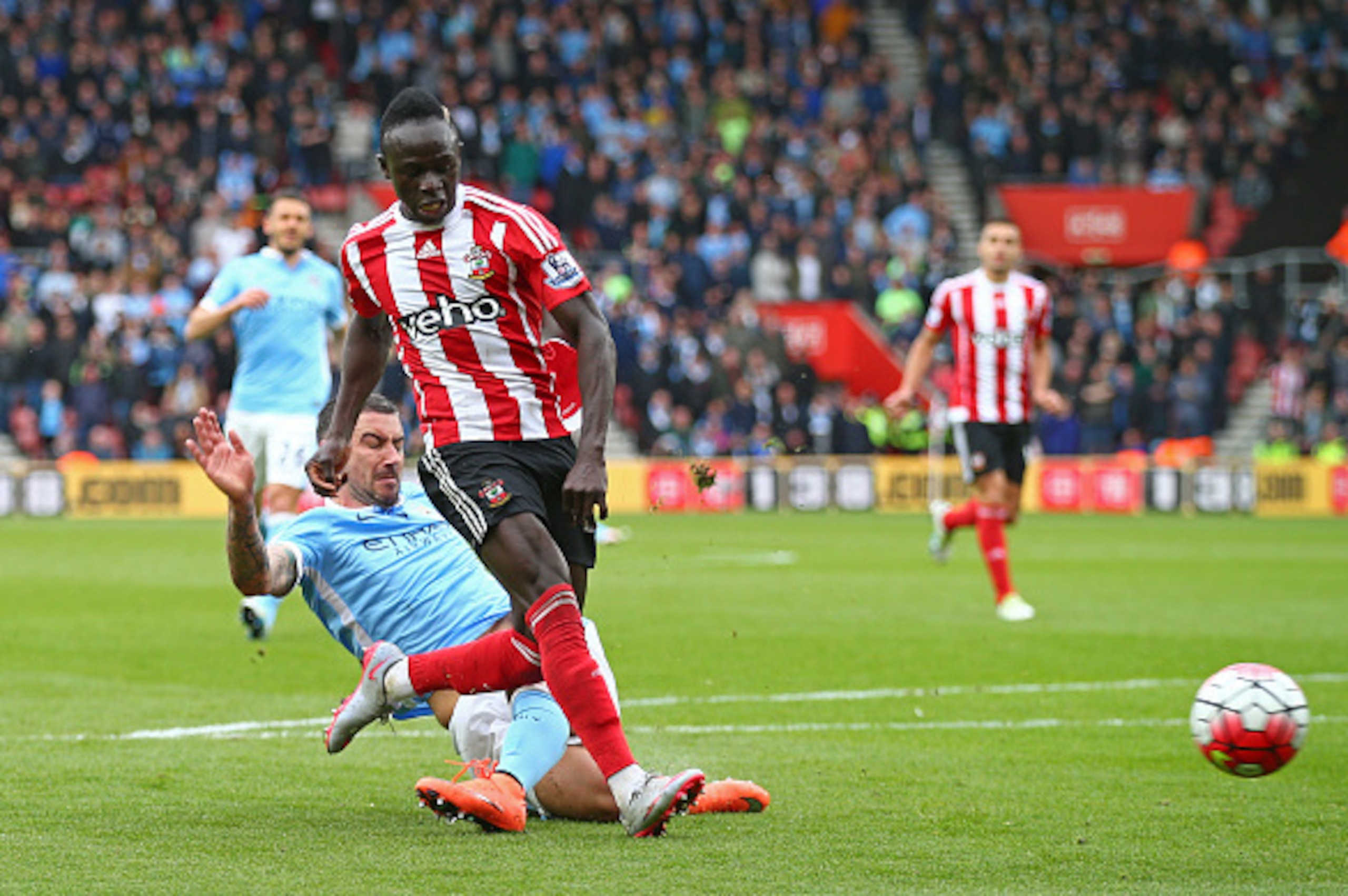 Aleksandar Kolarov cannot get back to stop Sadio Mane scoring for Southampton.