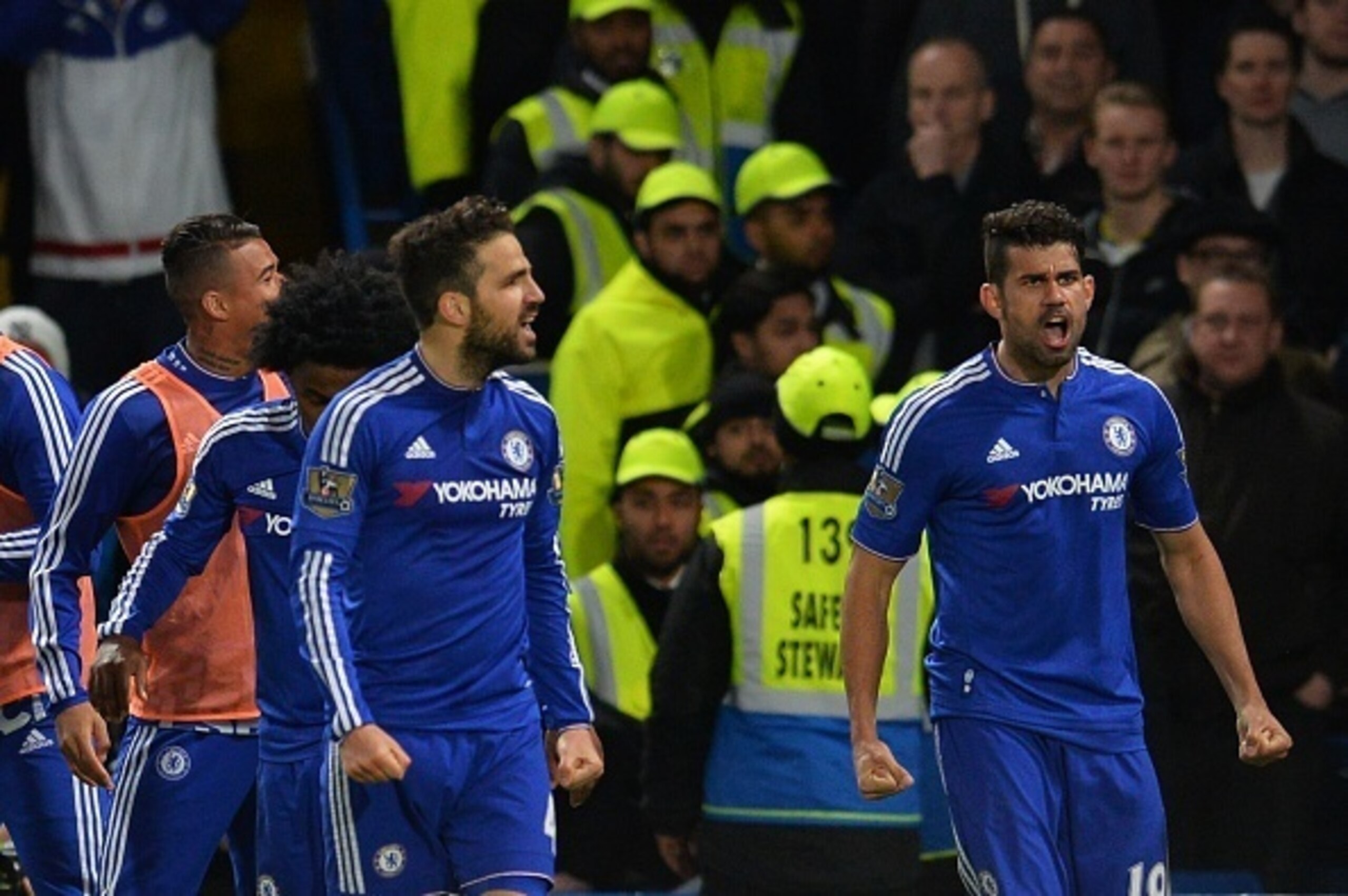 Costa celebrates with his Chelsea team-mates after they brought it back to 2-2.