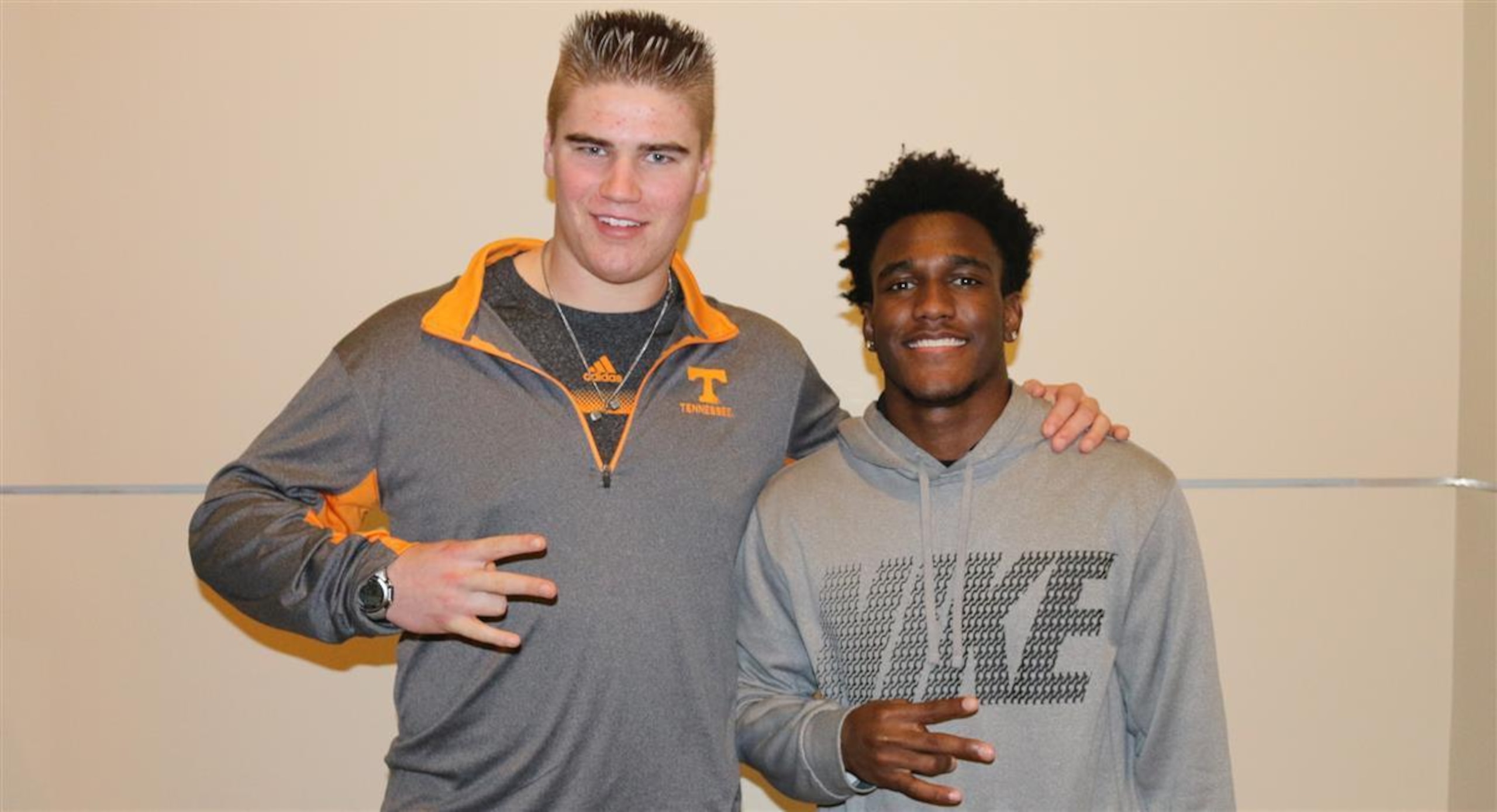 Ryan Johnson (left) with defensive back commitment Marquill Osborne, is one of UT's tackles of the future.