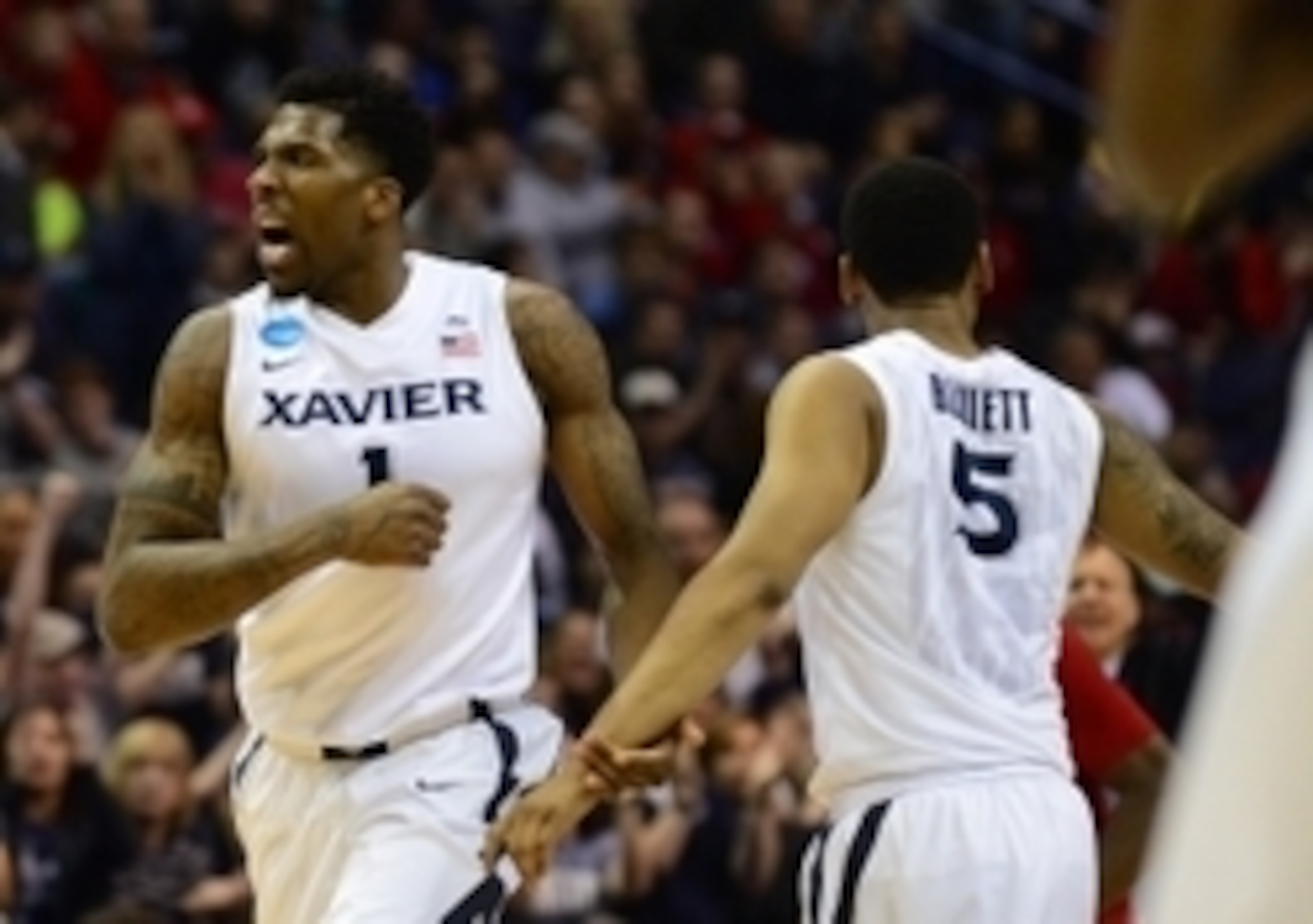 Jalen Reynolds (1) and Trevon Bluiett (5) Jalen Reynolds (1) and Trevon Bluiett (5)