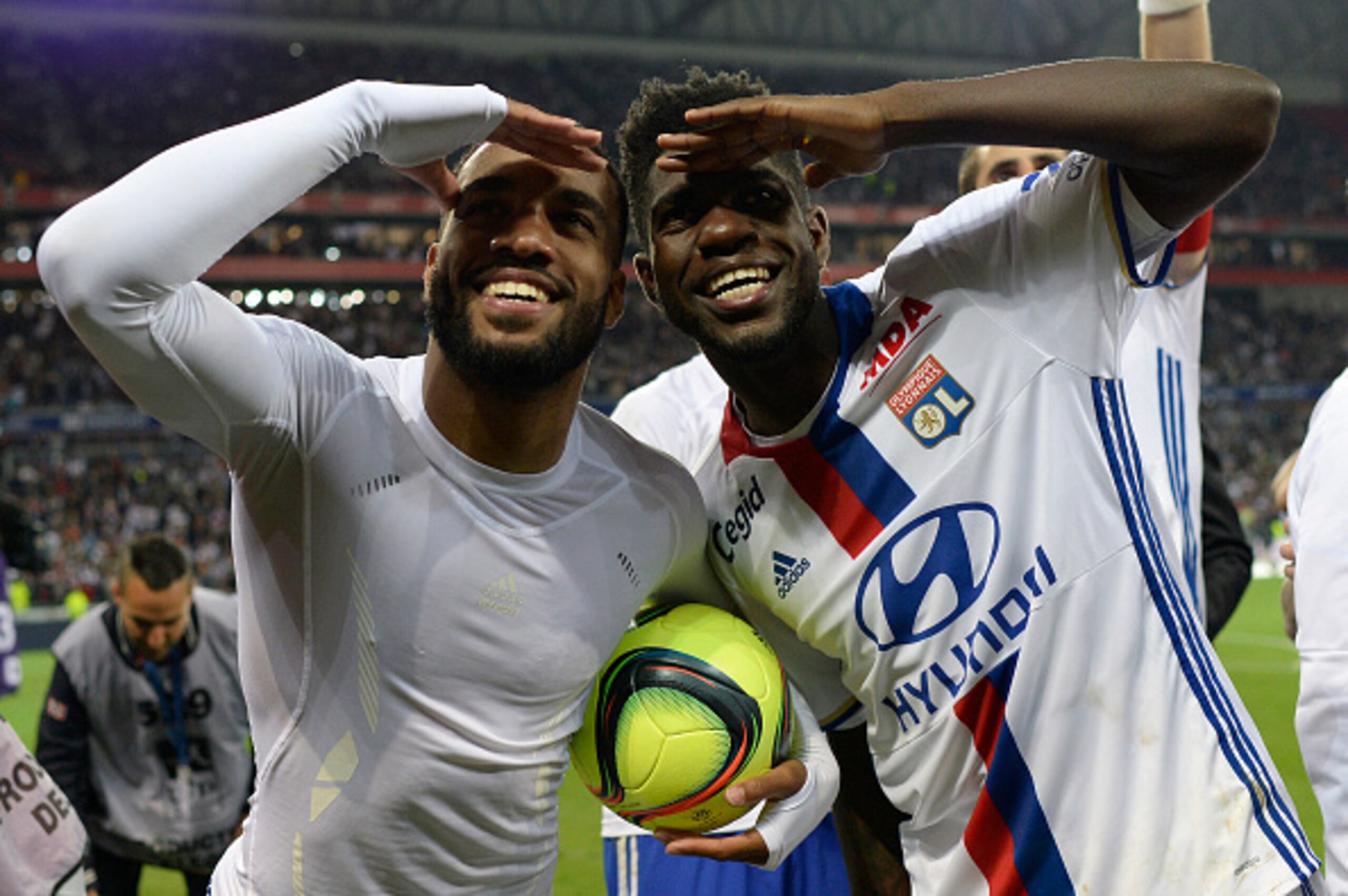 Lacazette holding the match ball.