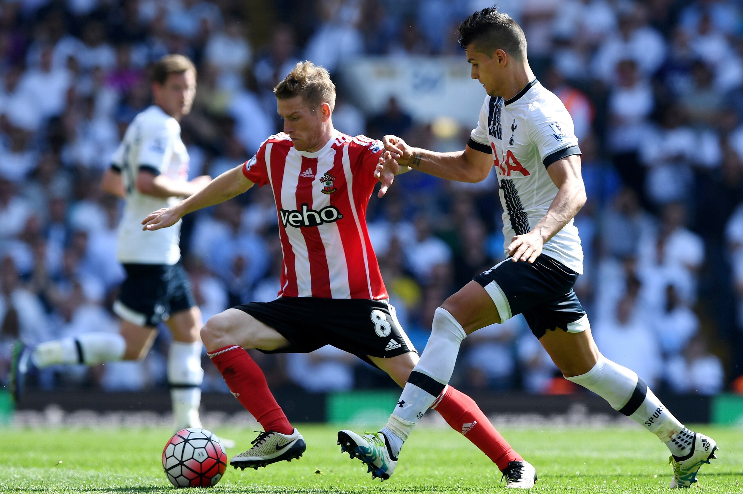 Steven Davis scored twice to help Southampton upset Tottenham at White Hart Lane.
