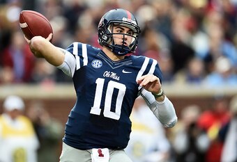 OXFORD, MS - NOVEMBER 07:  Chad Kelly #10 of the Mississippi Rebels drops back to pass during a game against the Arkansas Razorbacks at Vaught-Hemingway Stadium on November 7, 2015 in Oxford, Mississippi.  (Photo by Stacy Revere/Getty Images)