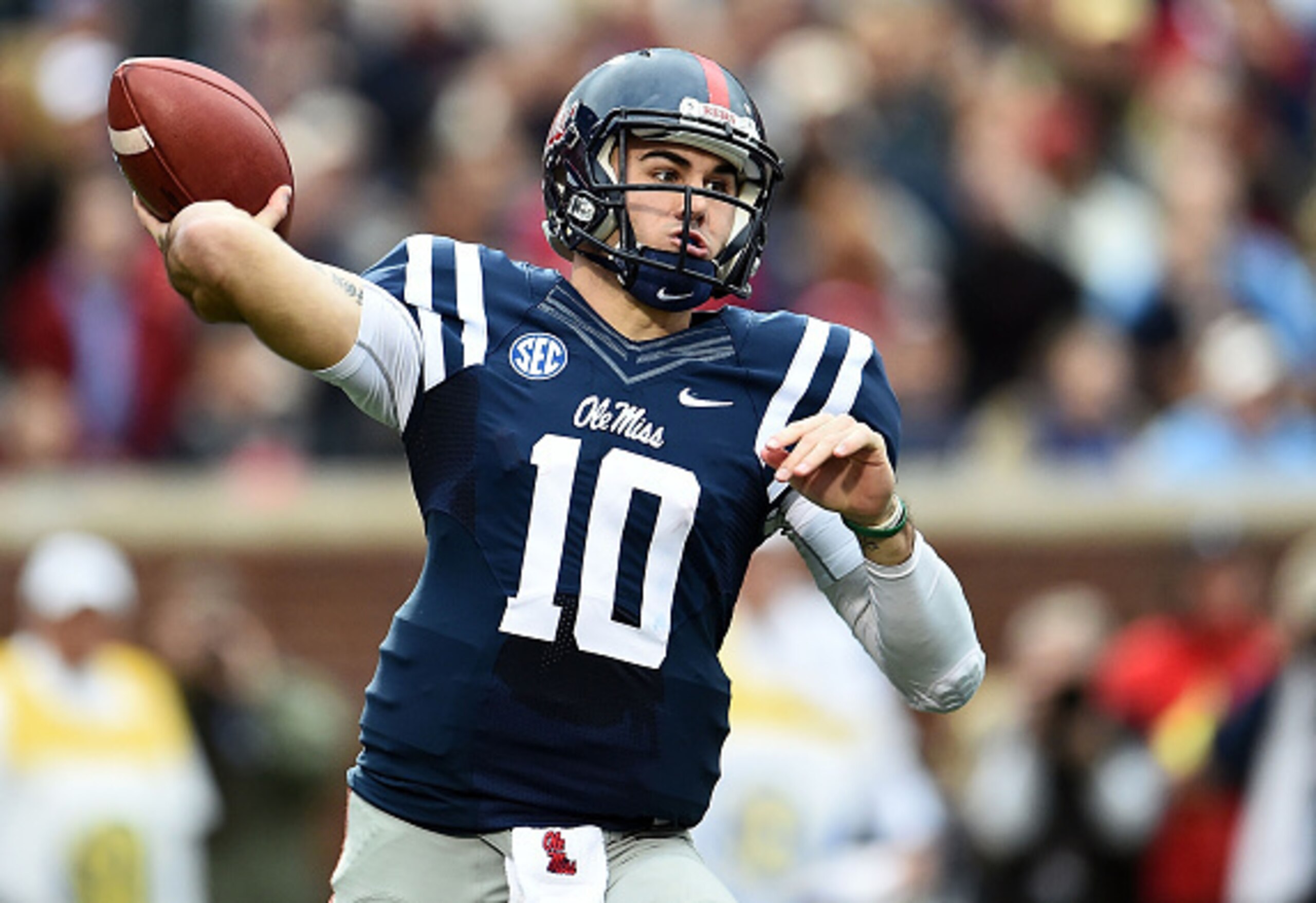 OXFORD, MS - NOVEMBER 07:  Chad Kelly #10 of the Mississippi Rebels drops back to pass during a game against the Arkansas Razorbacks at Vaught-Hemingway Stadium on November 7, 2015 in Oxford, Mississippi.  (Photo by Stacy Revere/Getty Images)