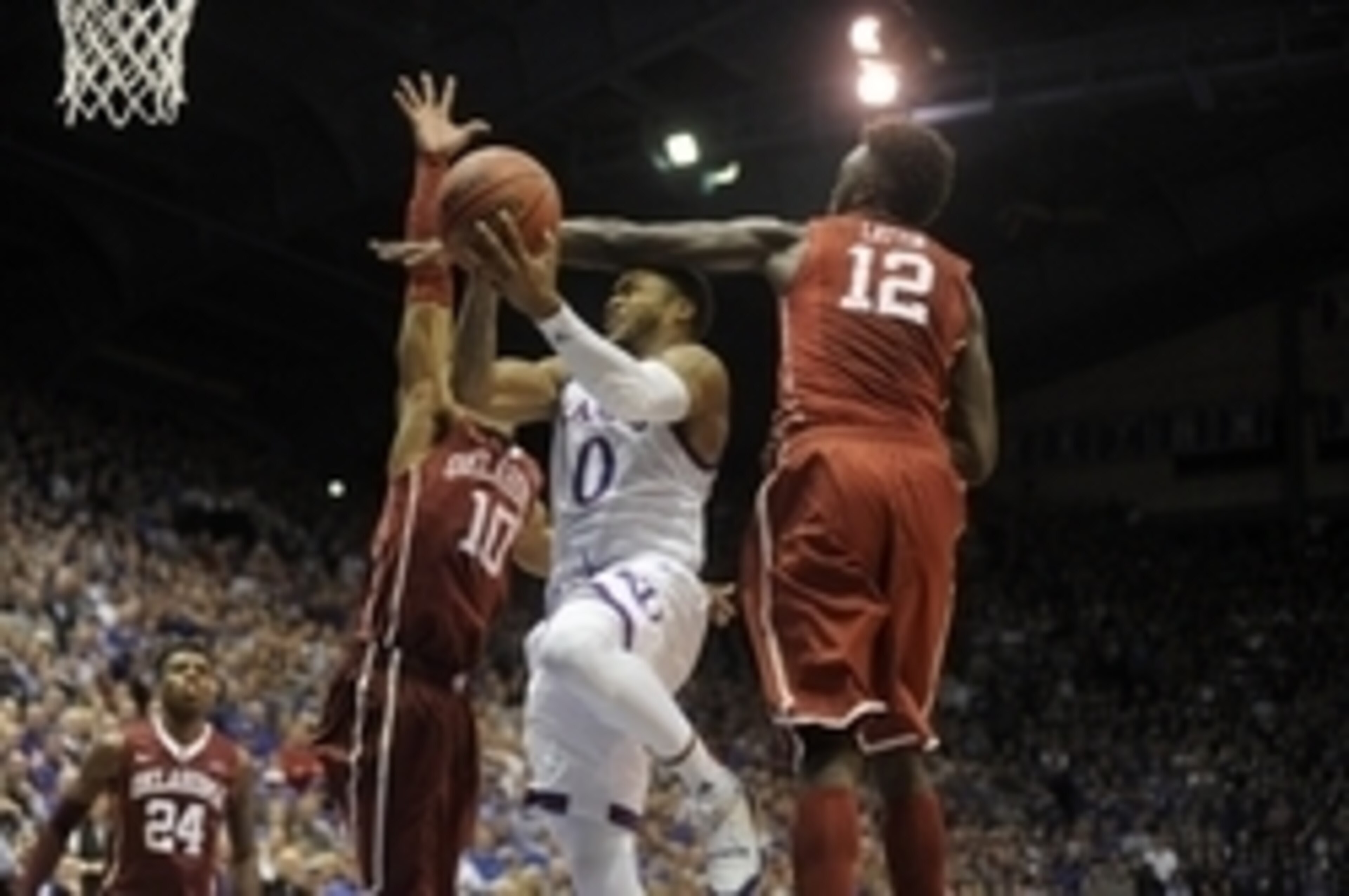 Jordan Woodard (10) and Khadeem Lattin (12)