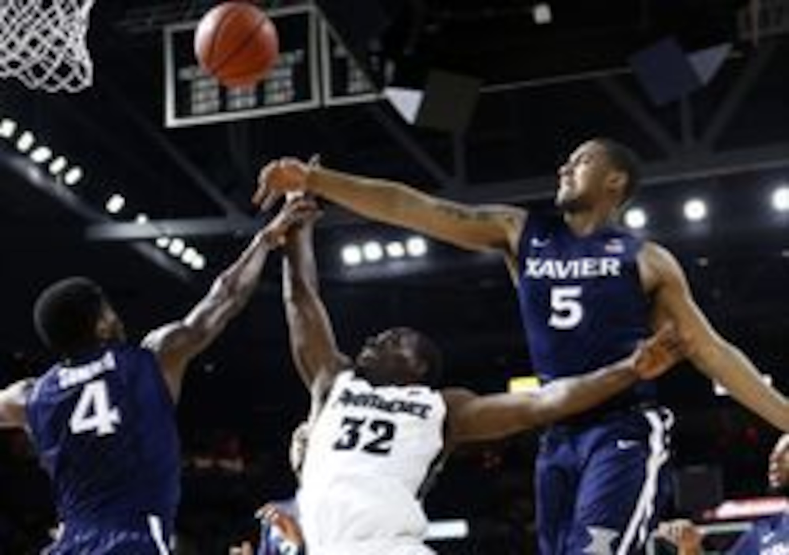 Trevon Bluiett (5) and Edmond Sumner (4)