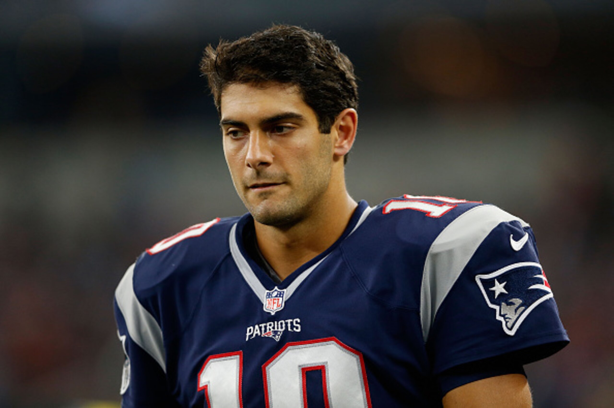 ARLINGTON, TX - OCTOBER 11:  Quarterback Jimmy Garoppolo #10 of the New England Patriots on the sidelines during the second half of the NFL game against the Dallas Cowboys at AT&T Stadium on October 11, 2015 in Arlington, Texas.  (Photo by Christian Peter