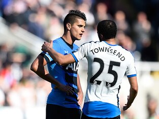 Former Tottenham man Andros Townsend comforts his old team-mate Erik Lamela.