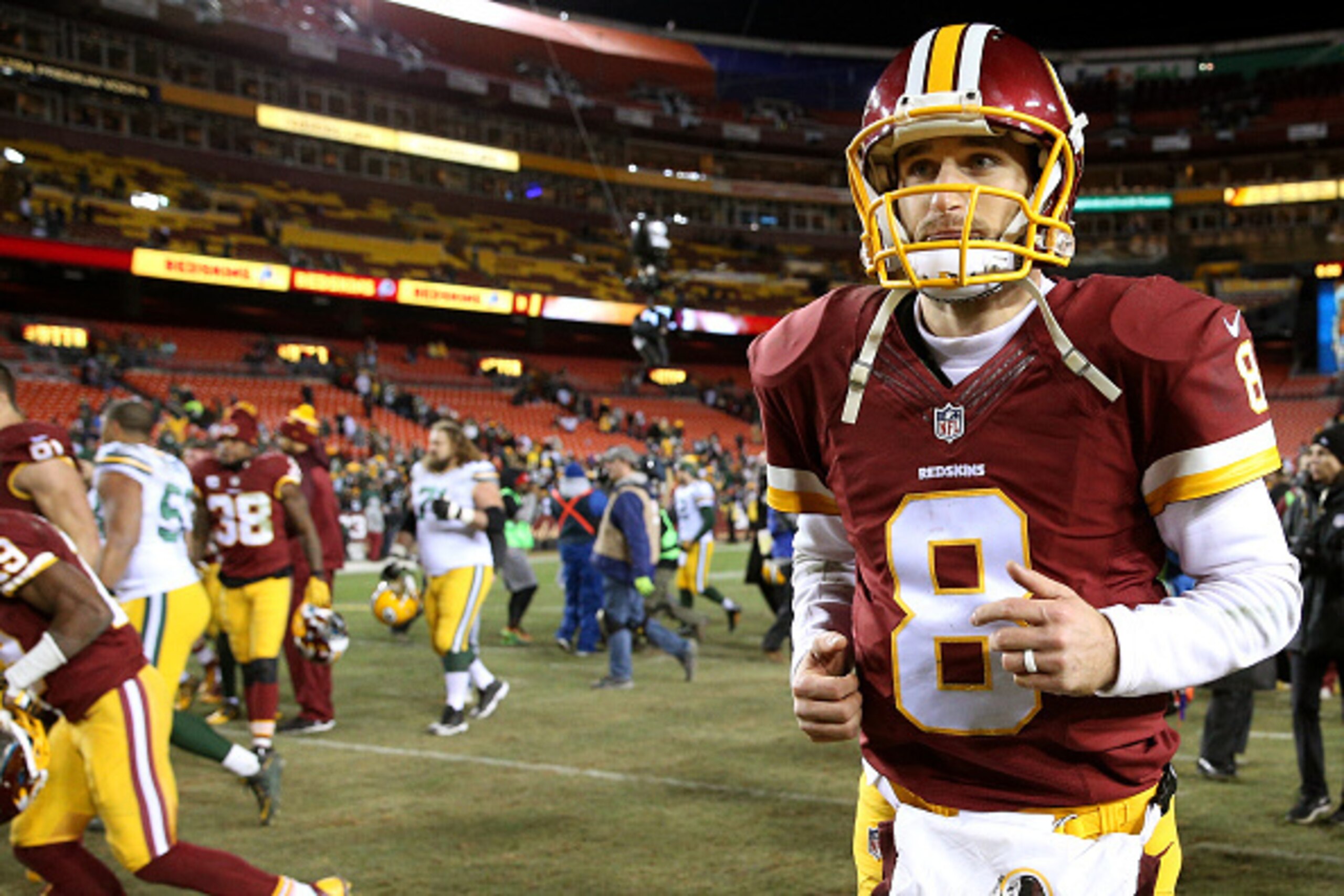 Quarterback Kirk Cousins will be in Washington for at least another year.