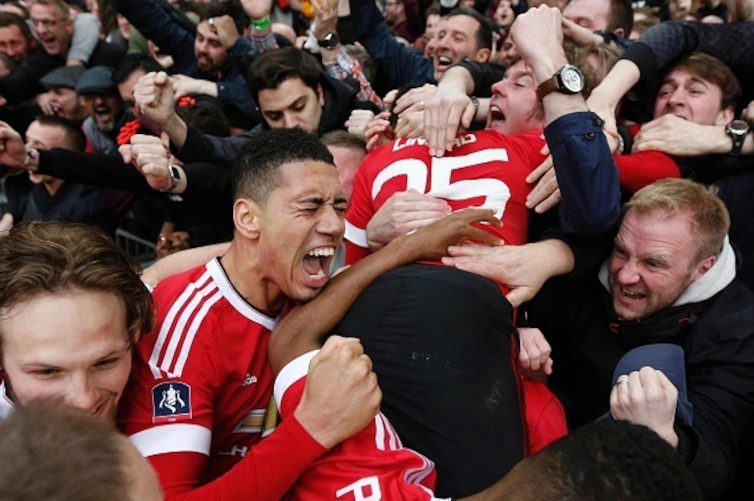 Smalling celebrates at Wembley. Smalling celebrates at Wembley.