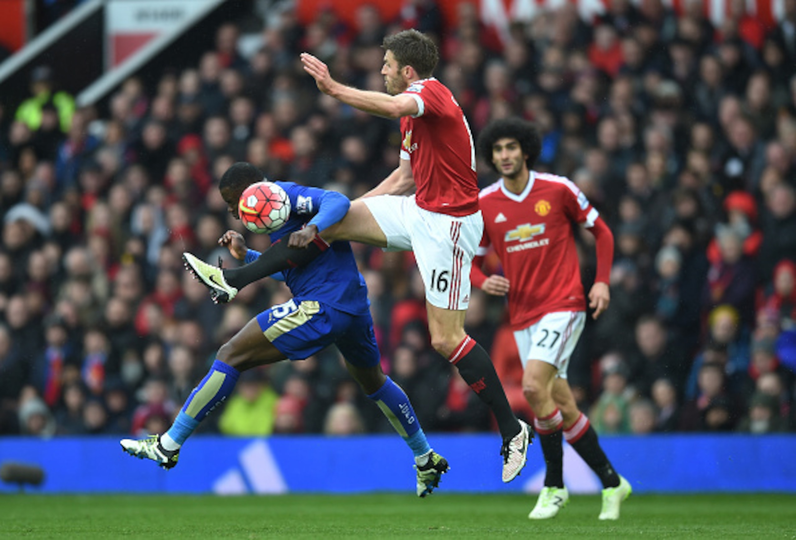 Michael Carrick gets physical against Leicester. Michael Carrick gets physical against Leicester.
