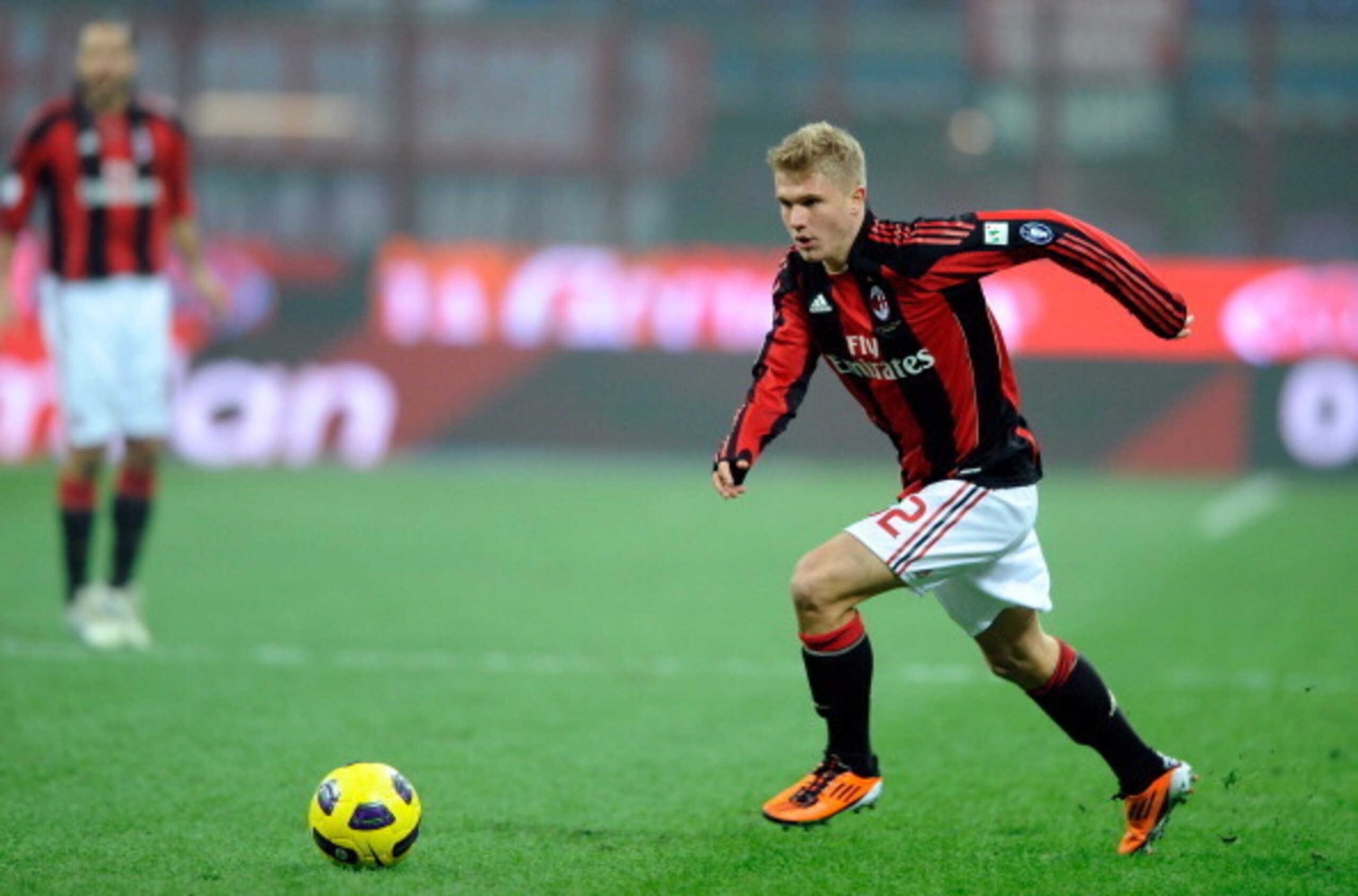 Alexander Merkel tees the ball up during his lone season in a Milan shirt.