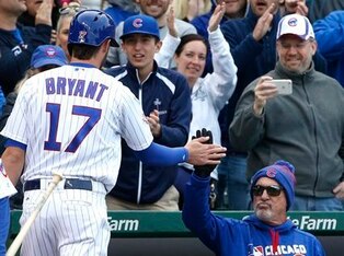 Kris Bryant and Chicago Cubs manager Joe Maddon.