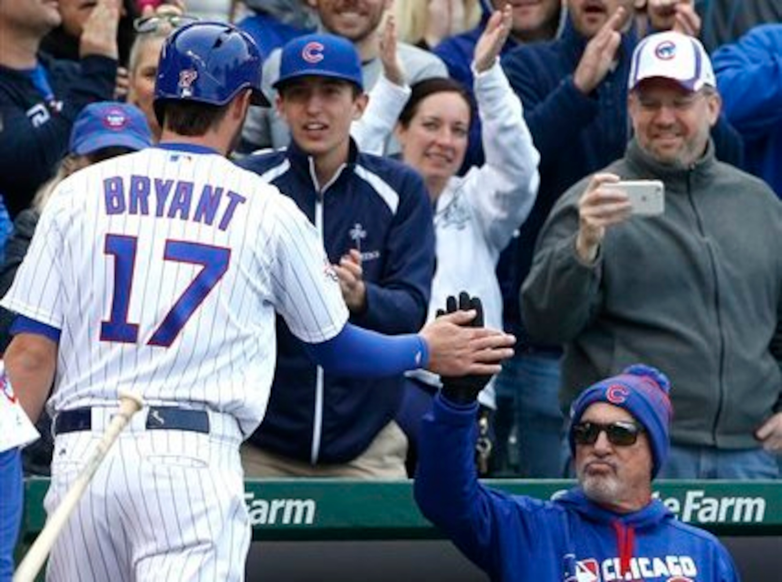Kris Bryant and Chicago Cubs manager Joe Maddon.