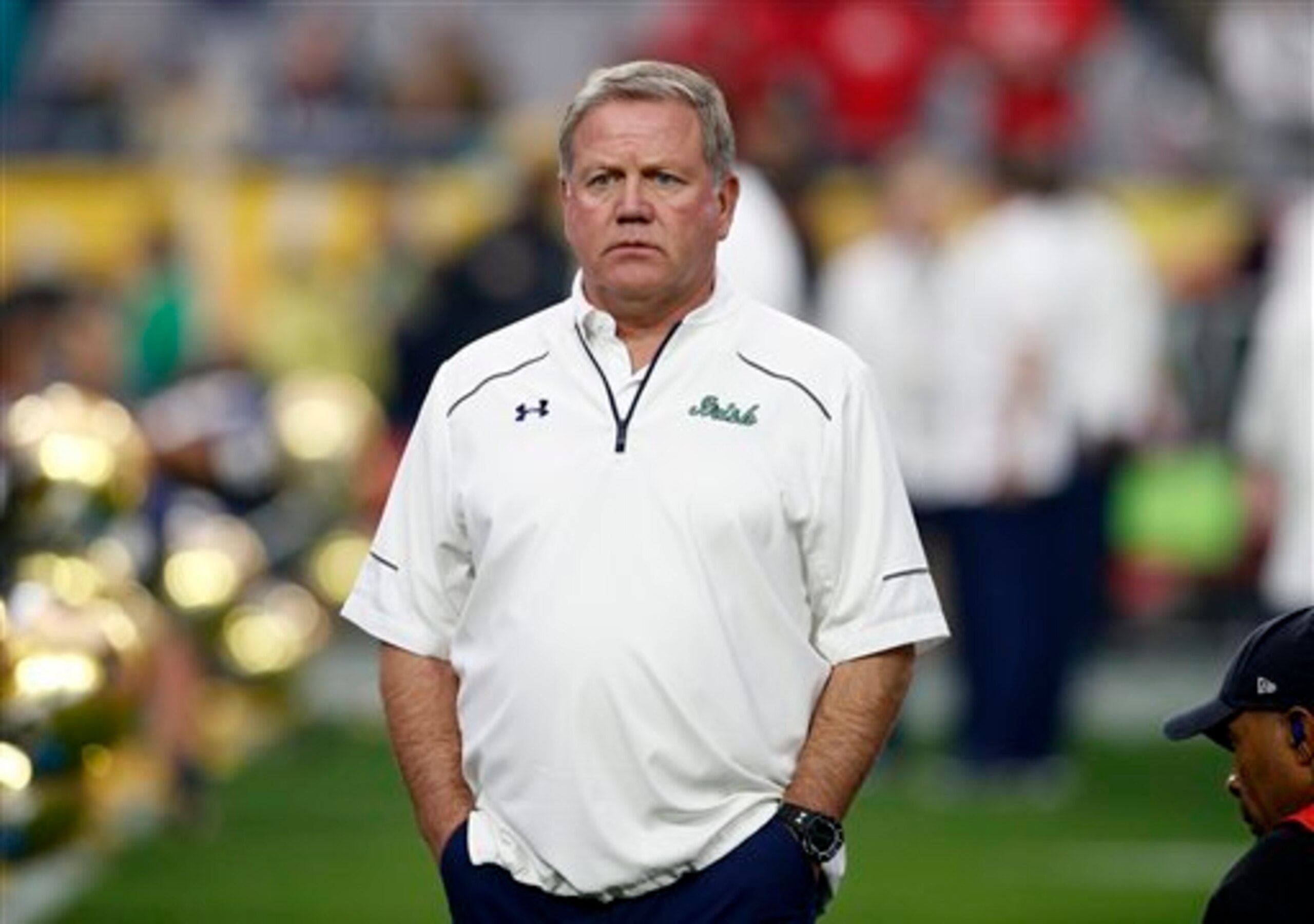 Brian Kelly faces a quarterback dilemma at Notre Dame this fall.