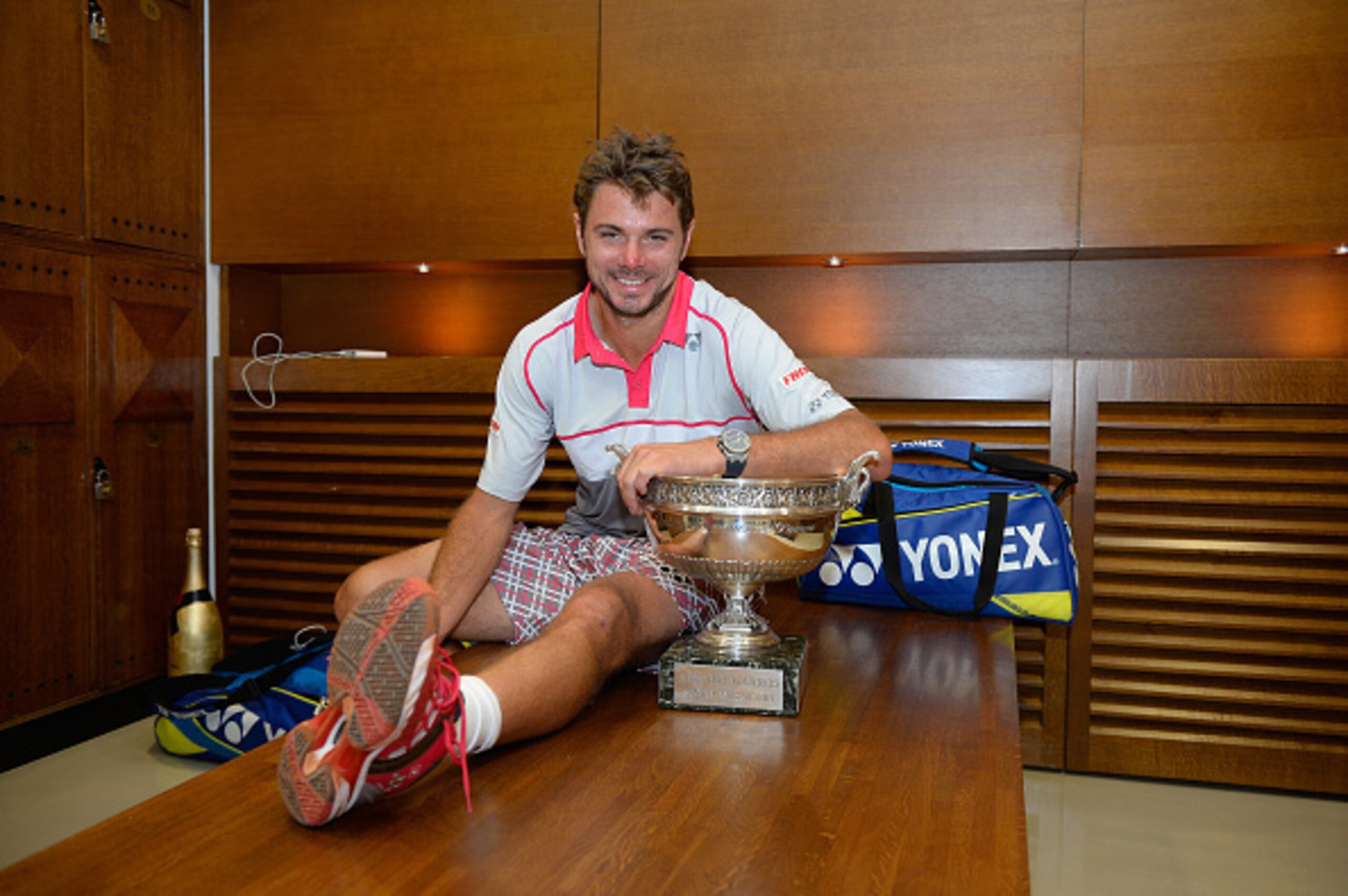 Stan Wawrinka poses with his new trophy after winning the 2015 French Open.
