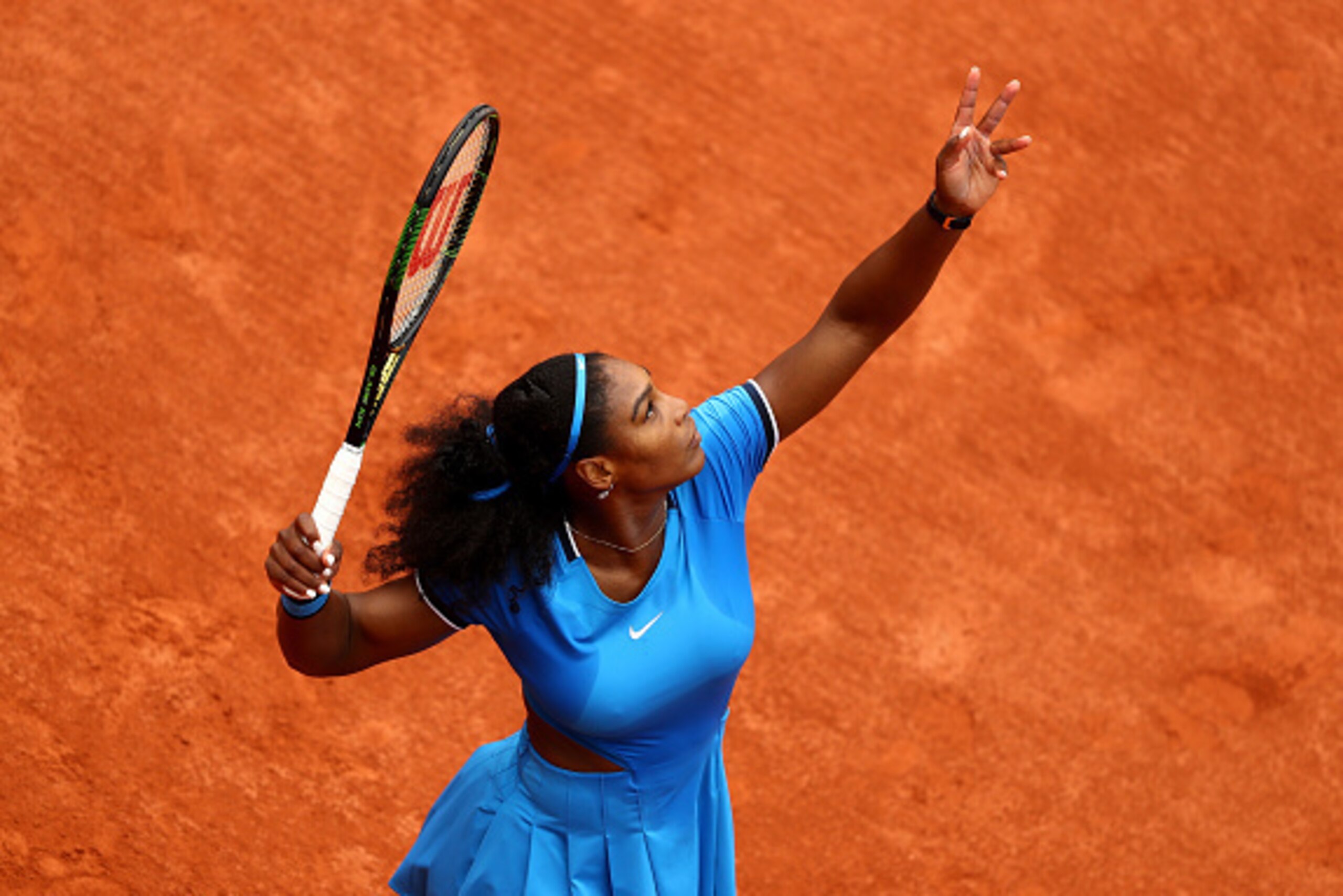 Serena Williams serves during her second-round match at the 2016 French Open.