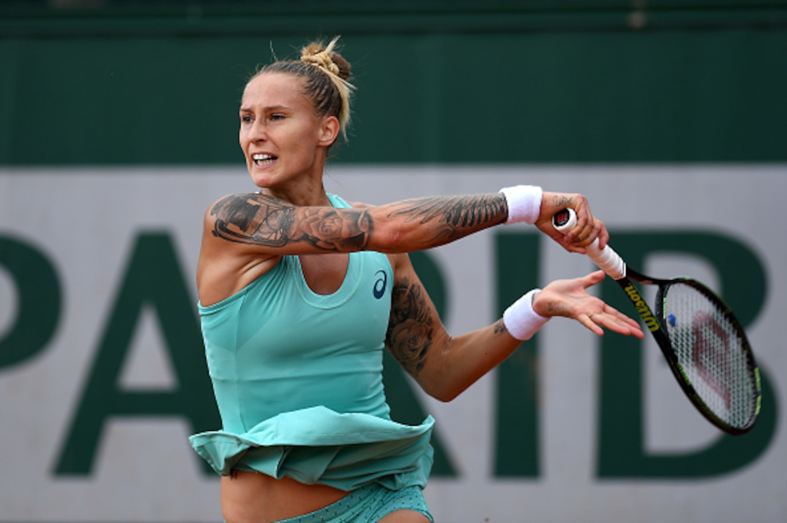 Polona Hercog hits a forehand during a match at the 2016 French Open.