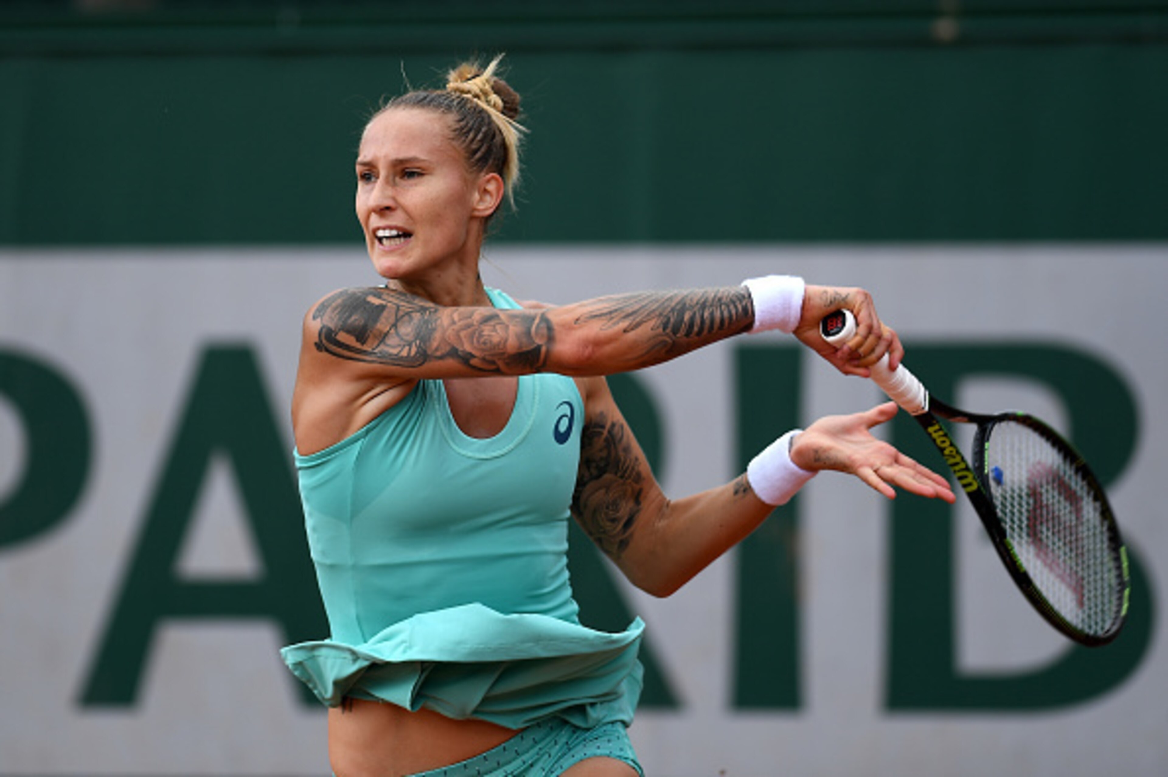 Polona Hercog hits a forehand during a match at the 2016 French Open.