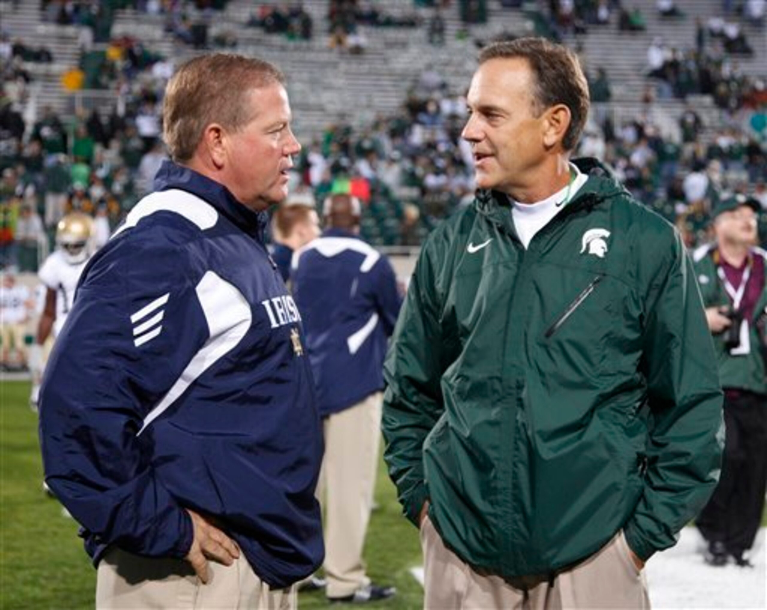 Notre Dame HC Brian Kelly and Michigan State HC Mark Dantonio in 2011