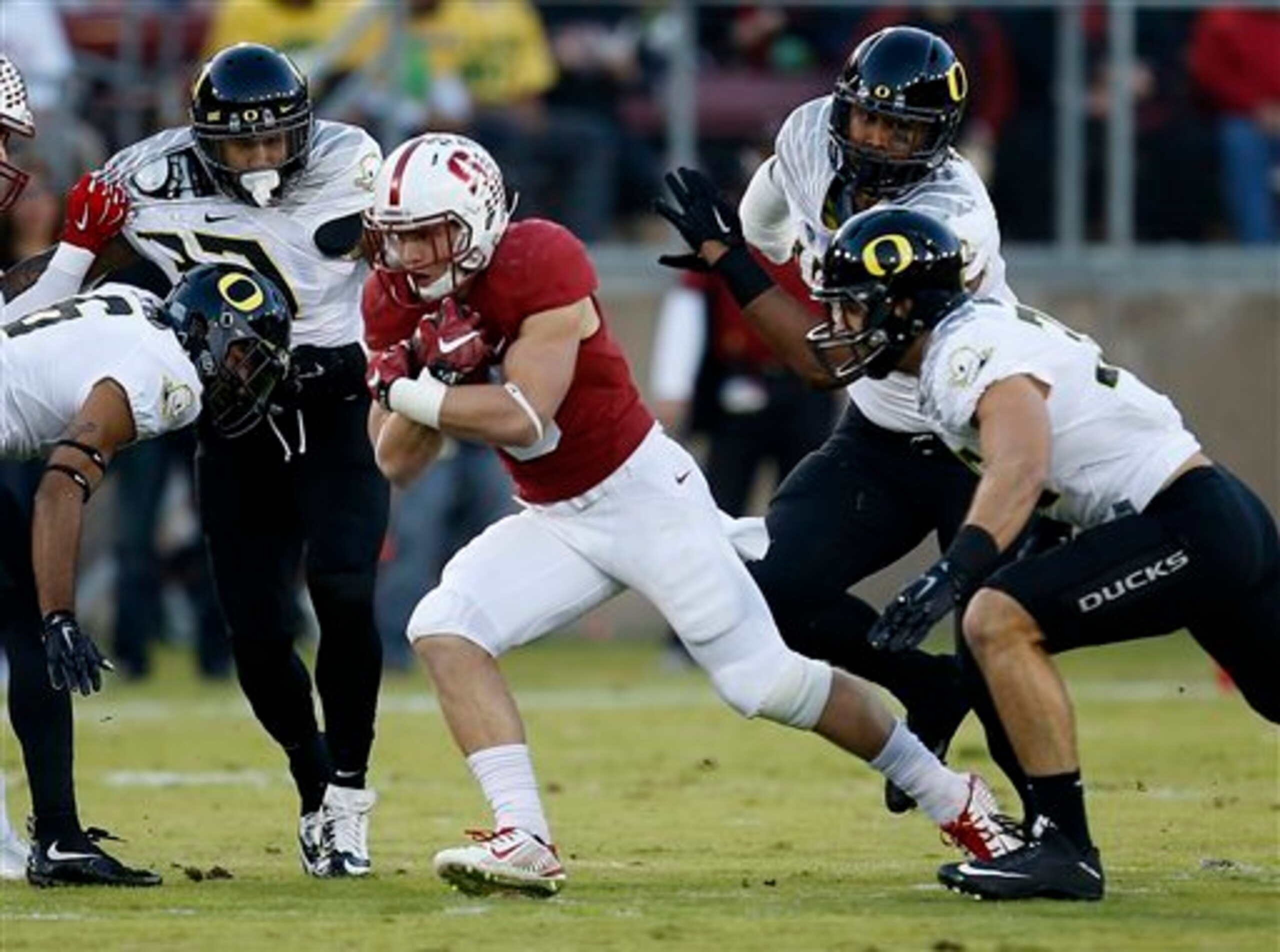 Stanford RB Christian McCaffrey (center)