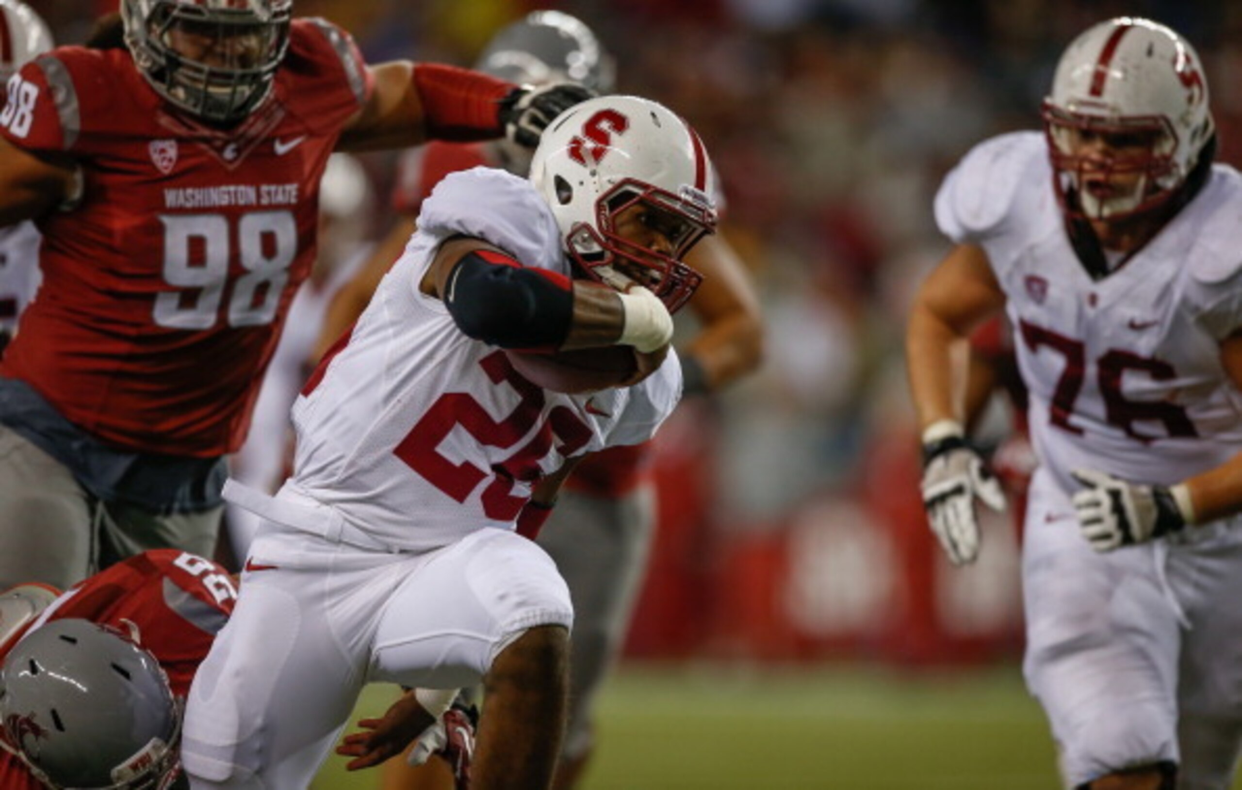 SEATTLE, WA - SEPTEMBER 28:  Running back Barry Sanders #26 of the Stanford Cardinal rushes against the Washington State Cougars on September 28, 2013 at CenturyLink Field in Seattle, Washington.  (Photo by Otto Greule Jr/Getty Images)