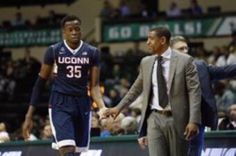 Amida Brimah (35) and Kevin Ollie