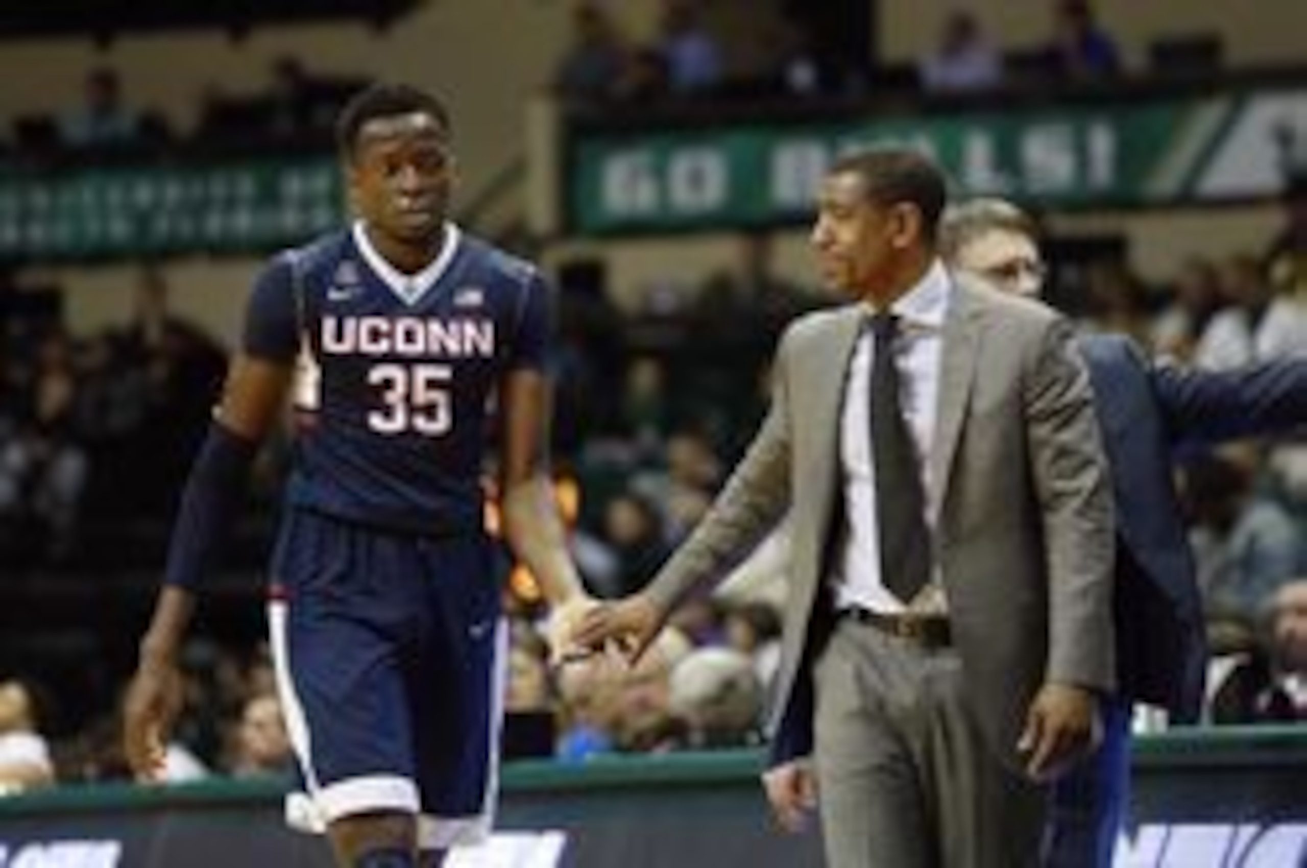 Amida Brimah (35) and Kevin Ollie