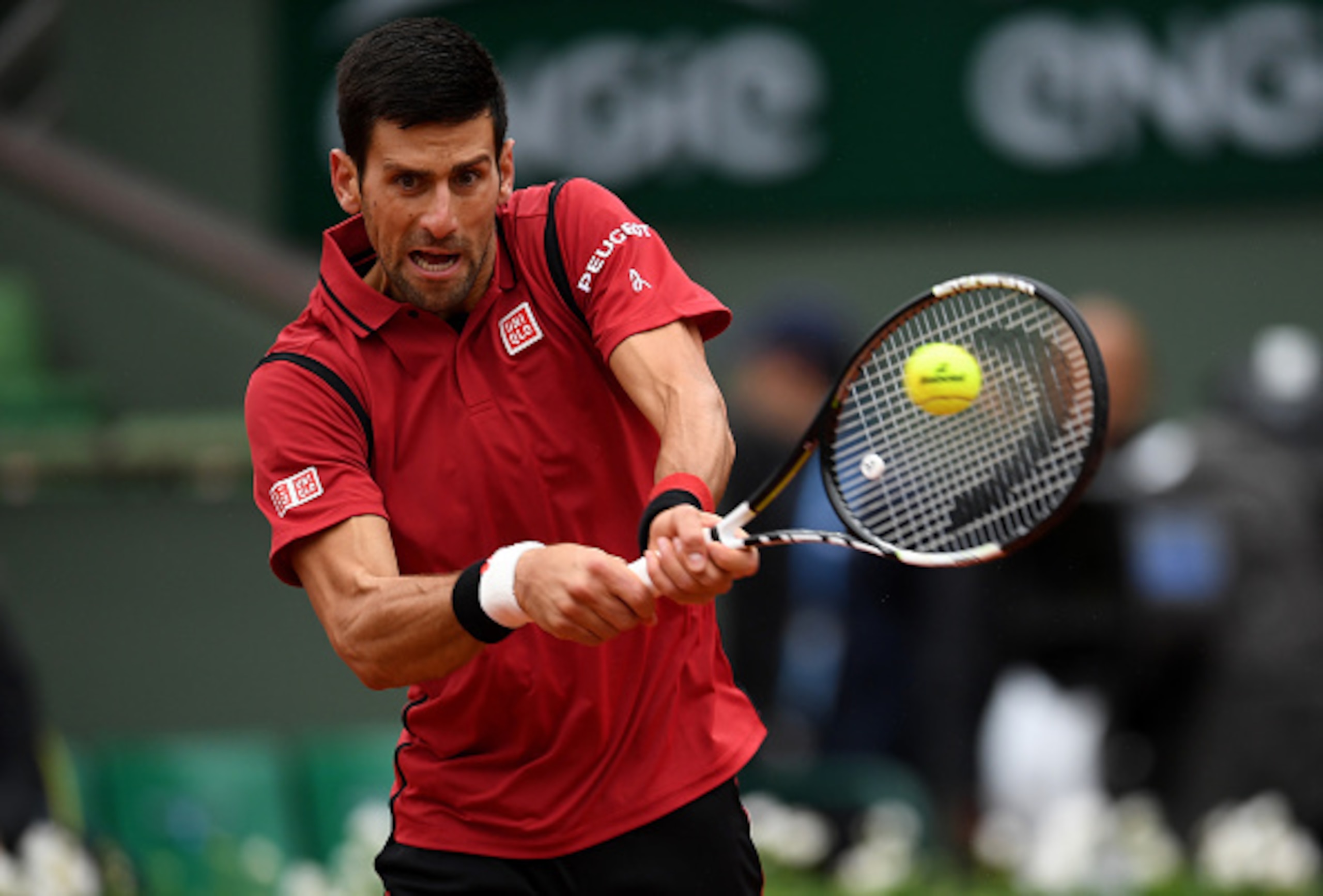 Novak Djokovic hits a backhand during the 2016 French Open.