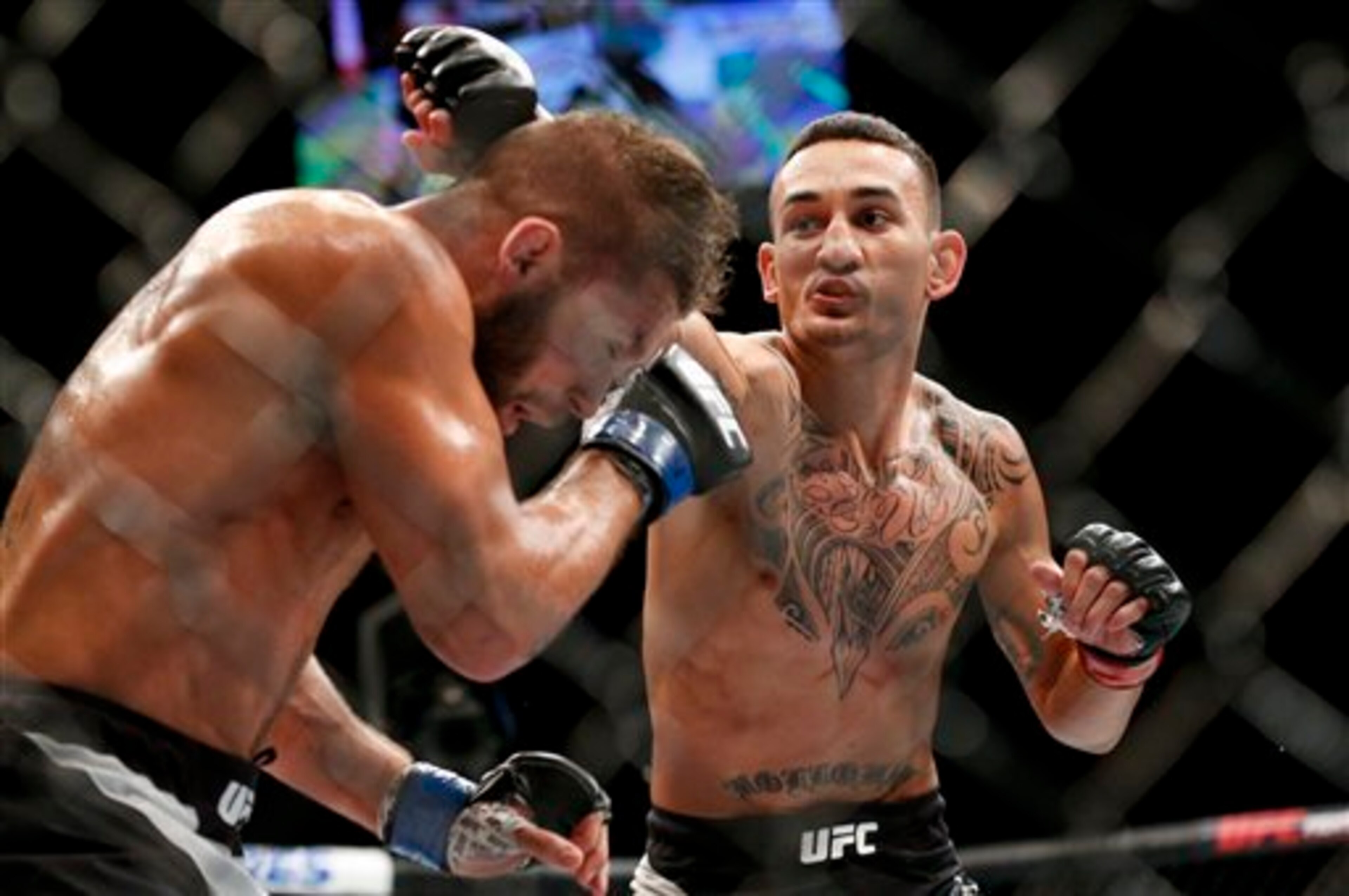 Max Holloway (right)