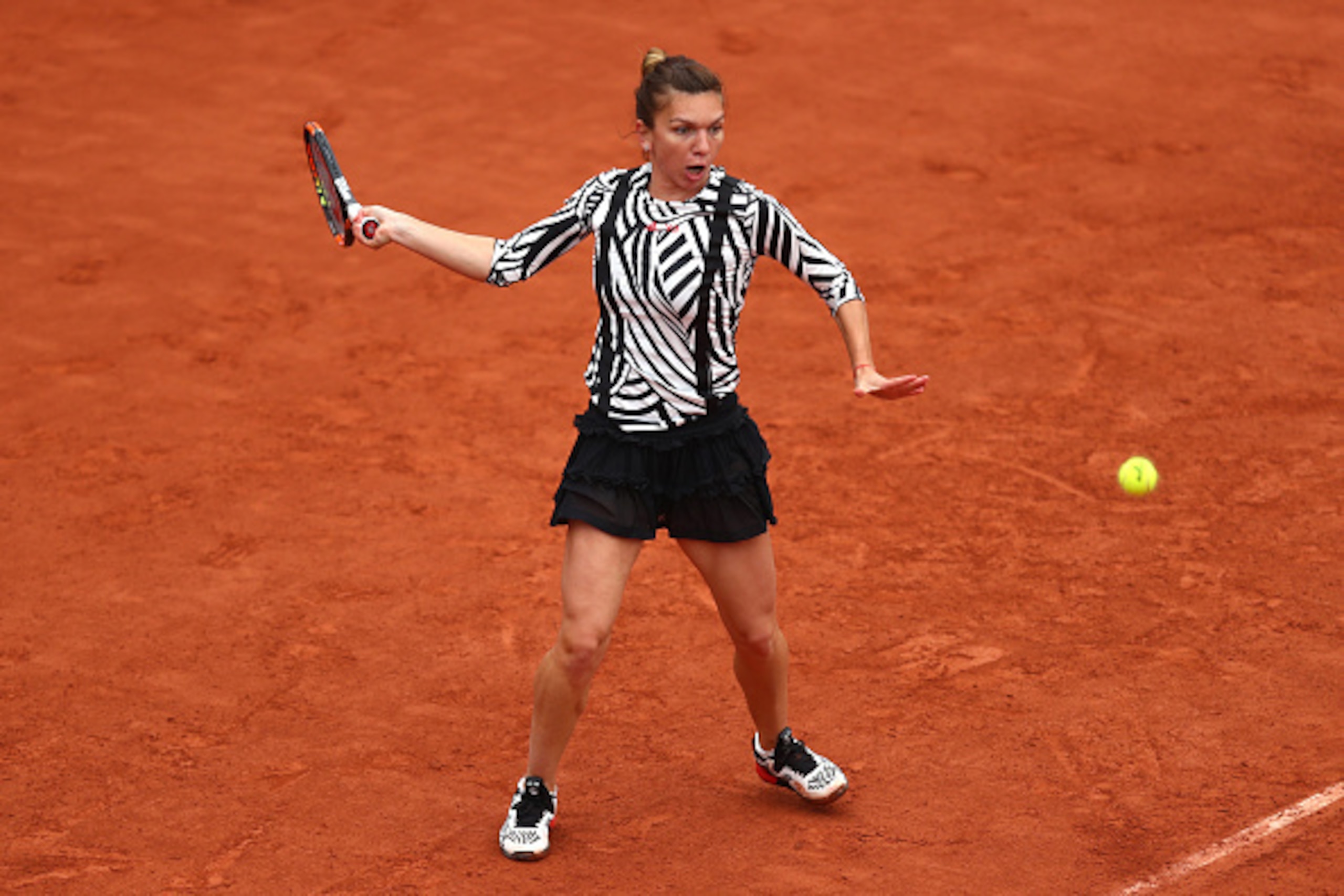 Simona Halep prepares to hit a forehand at the 2016 French Open.